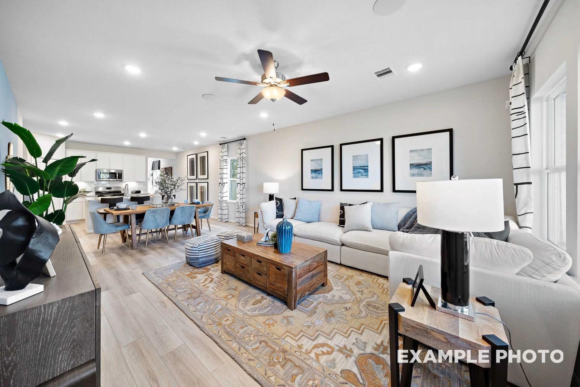 Open-concept living room and dining area in San Marcos E floor plan by Davidson Homes in Heartland, Texas.