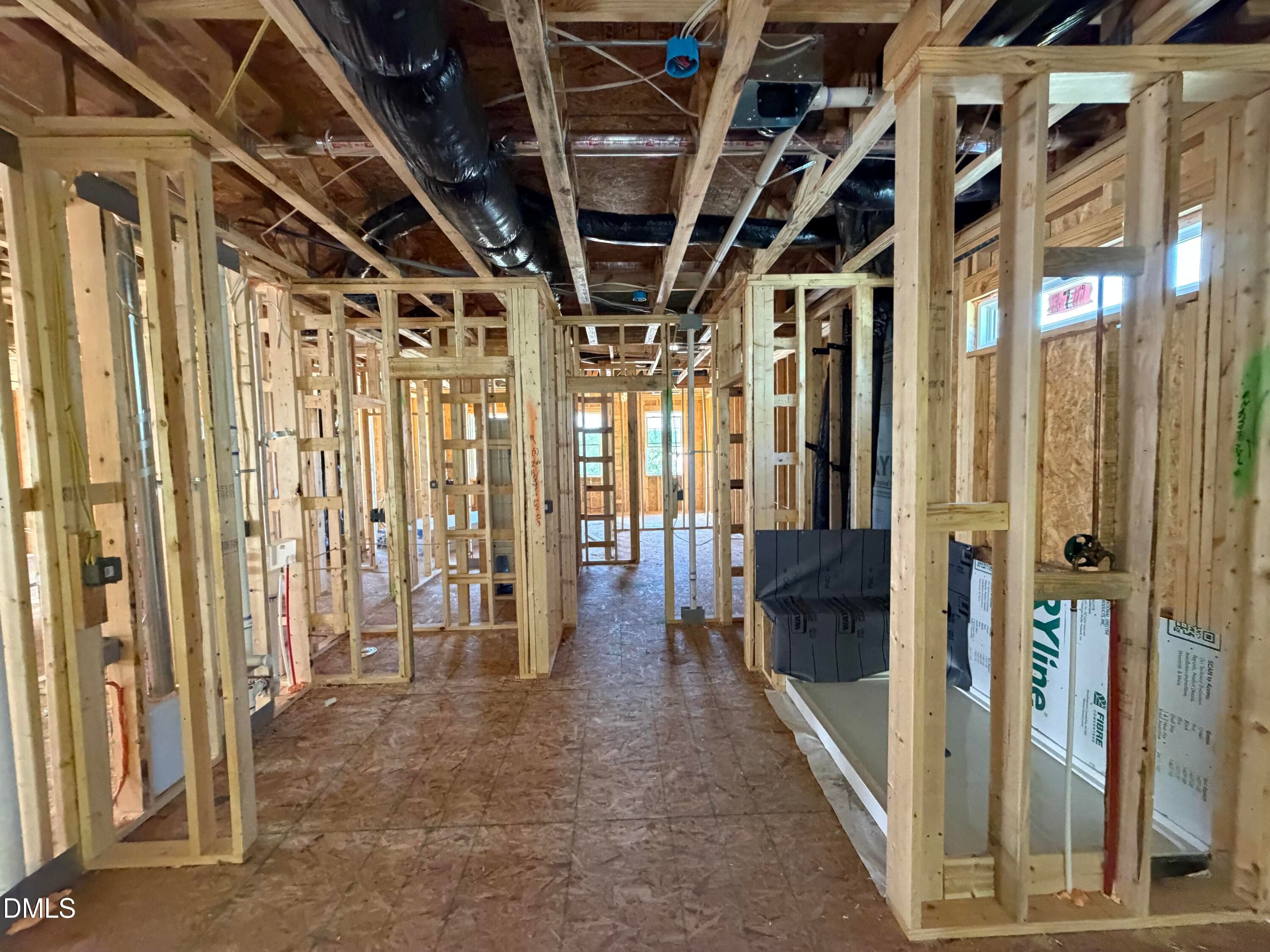 Interior wood framing and ductwork under construction in Davidson Homes' The Aspen C, 5-bedroom new home in Wendell Ridge, NC