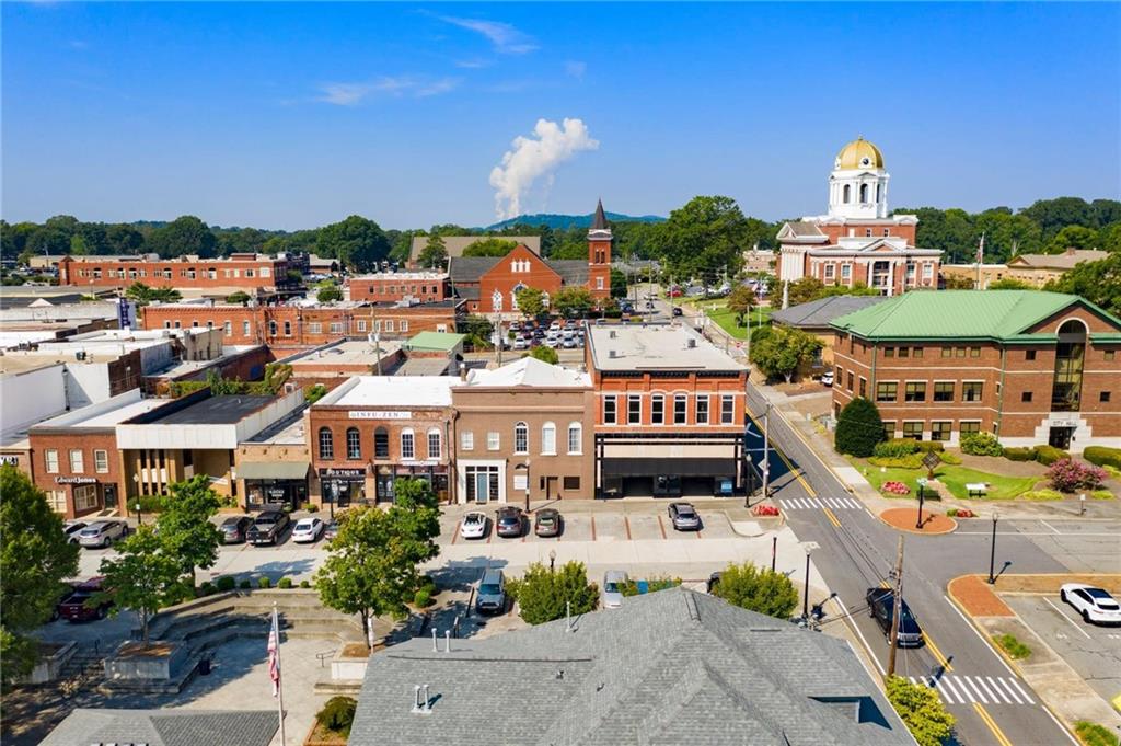 Aerial view of historic downtown Cartersville, Georgia, near Greene Farm community featuring courthouse dome and brick storefronts