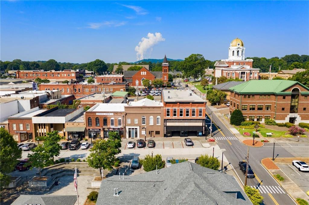 Aerial view of historic downtown Cartersville, Georgia, near Greene Farm community featuring courthouse dome and brick storefronts