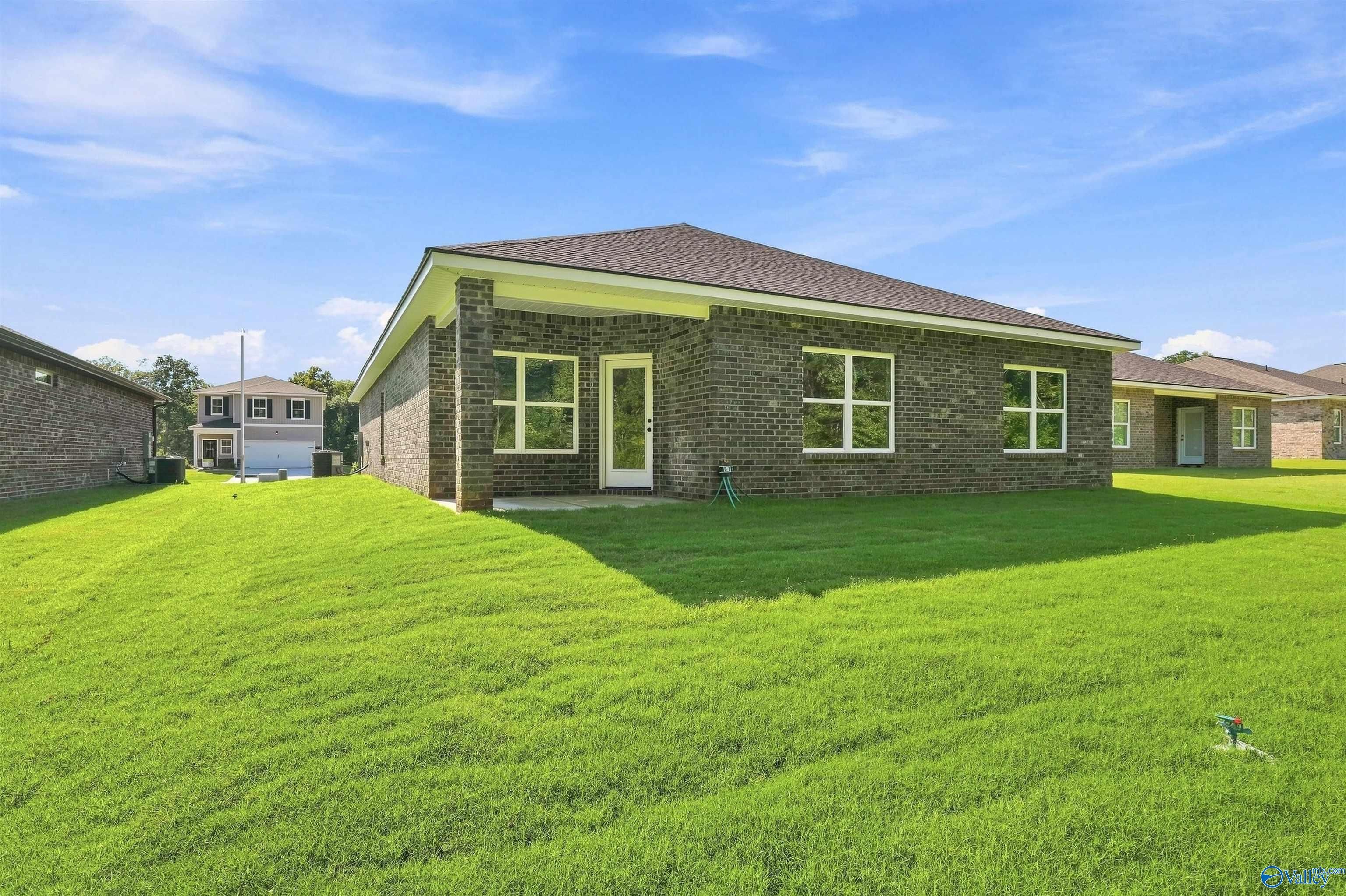 Back exterior view of The Daphne floor plan by Davidson Homes in Spragins Cove, Huntsville, Alabama.