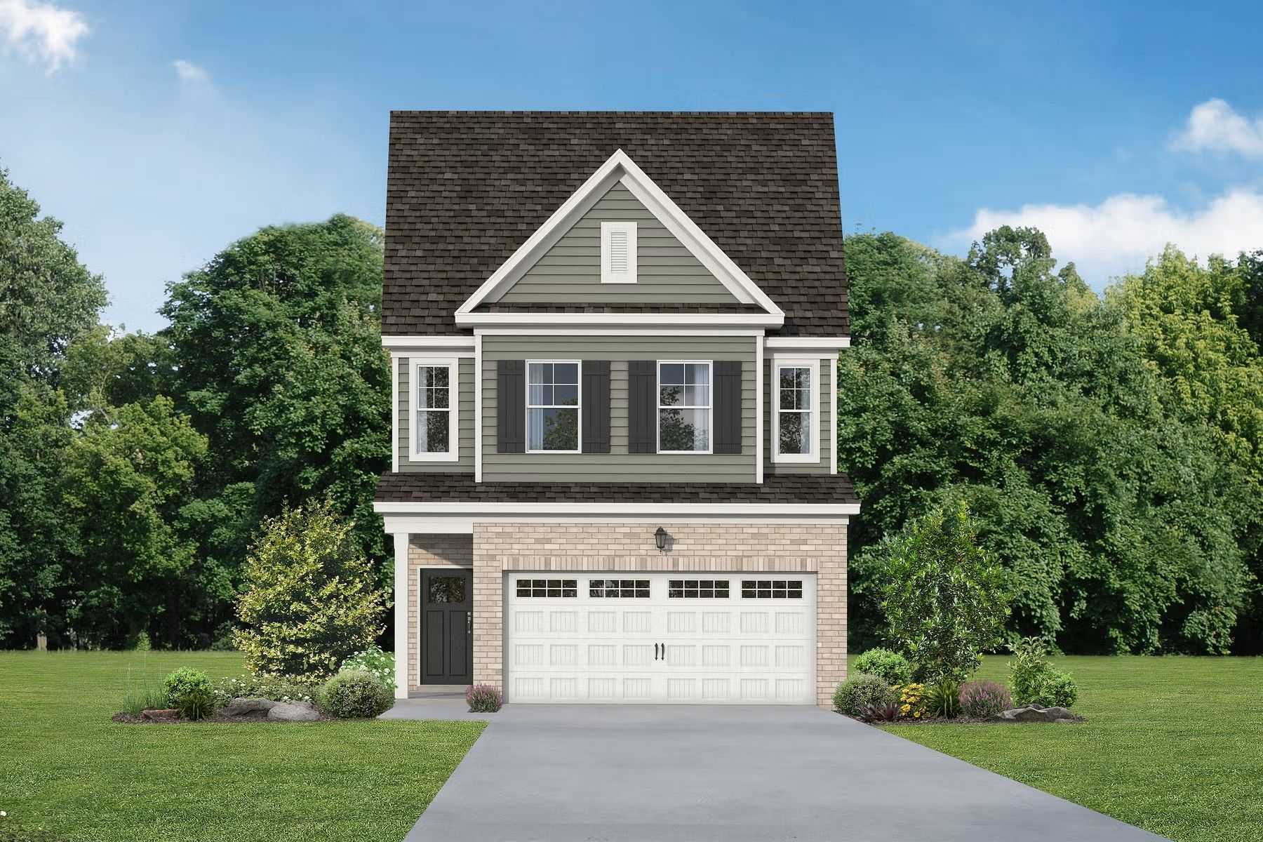 Two-story Durham D home exterior with gray siding, brick base, two-car garage, and lush landscaping in Lake Park Villas, Wylie, Texas