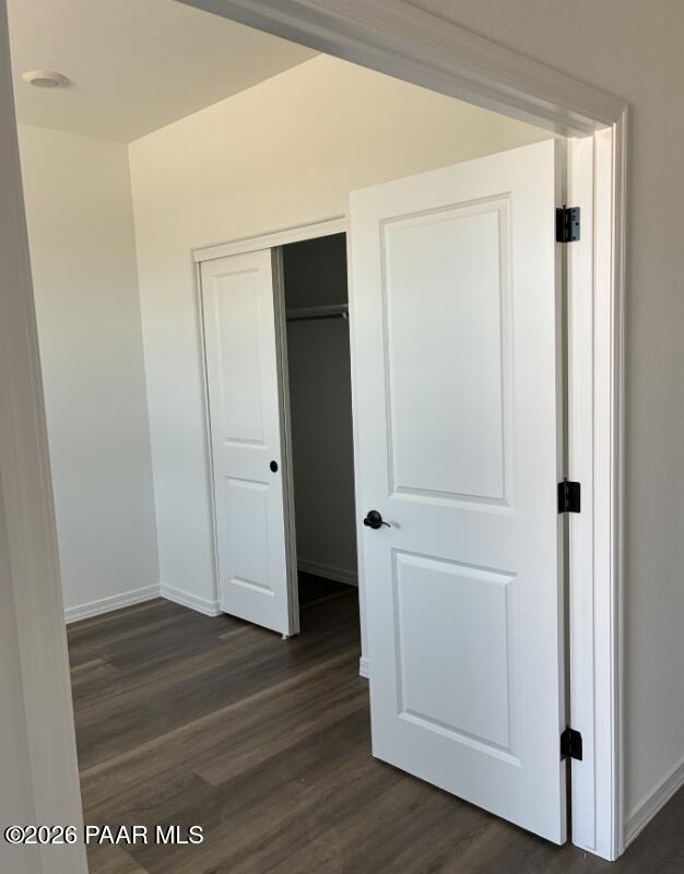 Bedroom with white interior doors and walk-in closet in The Coronado A floor plan, South Ranch, Prescott, Arizona.