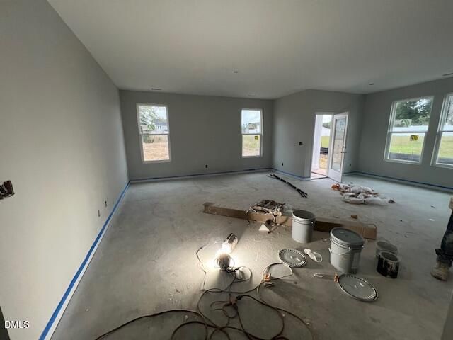 Spacious open-concept great room under construction in The Daphne C floor plan by Davidson Homes at Wellers Knoll, Lillington, NC.