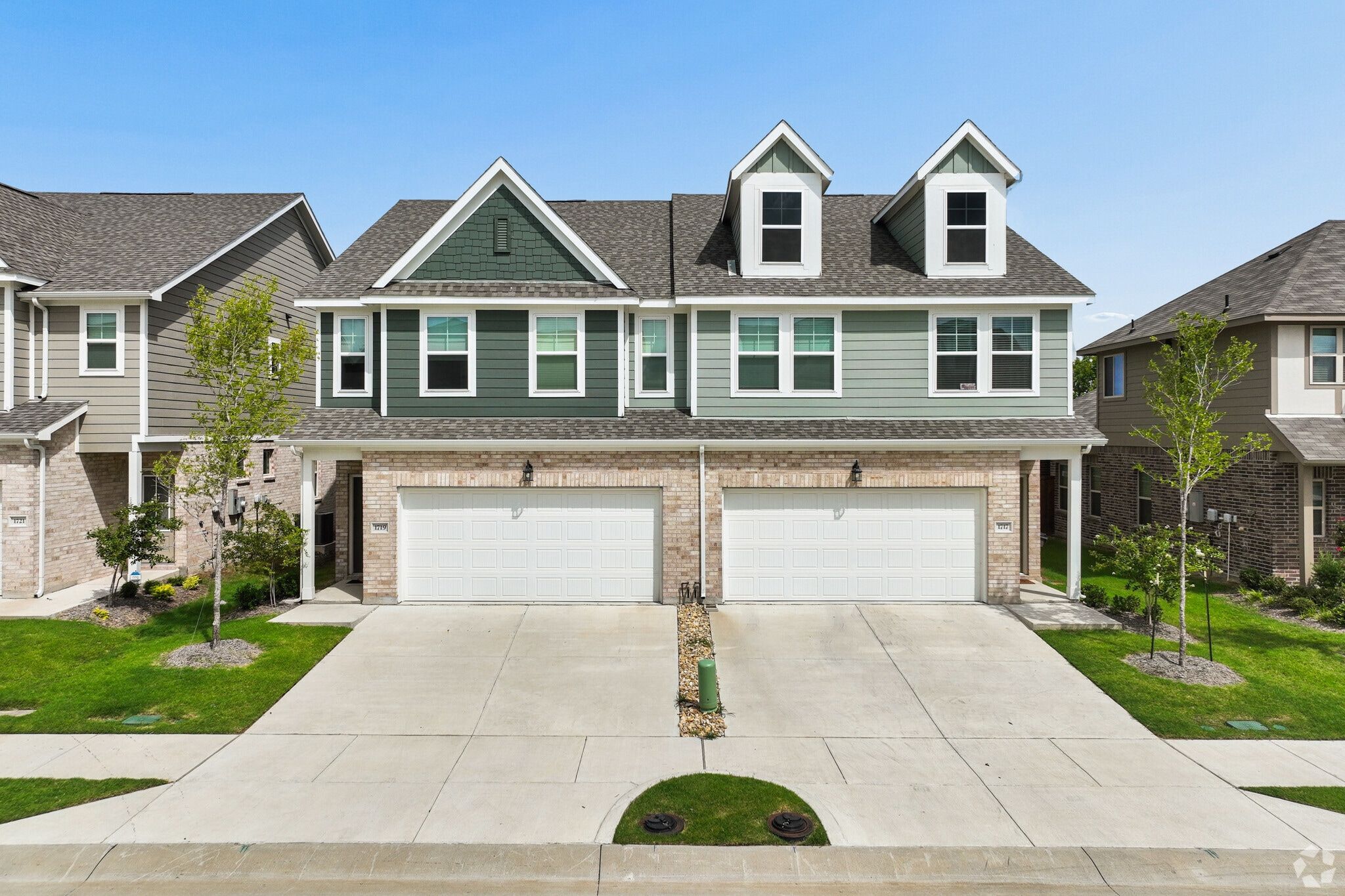 Modern two-story townhome in Wylie, TX with 2-car garage