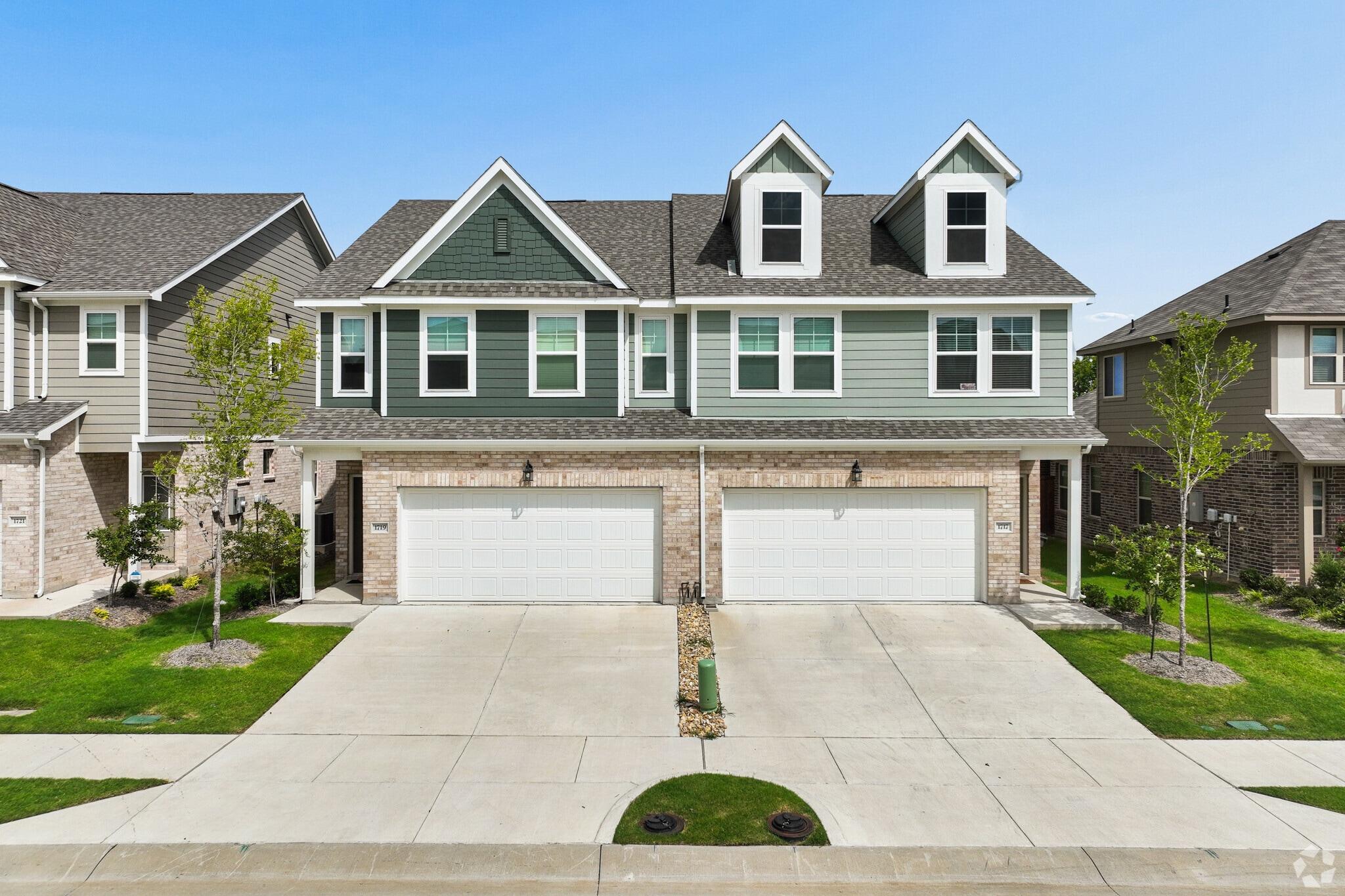 Modern two-story townhome in Wylie, TX with 2-car garage