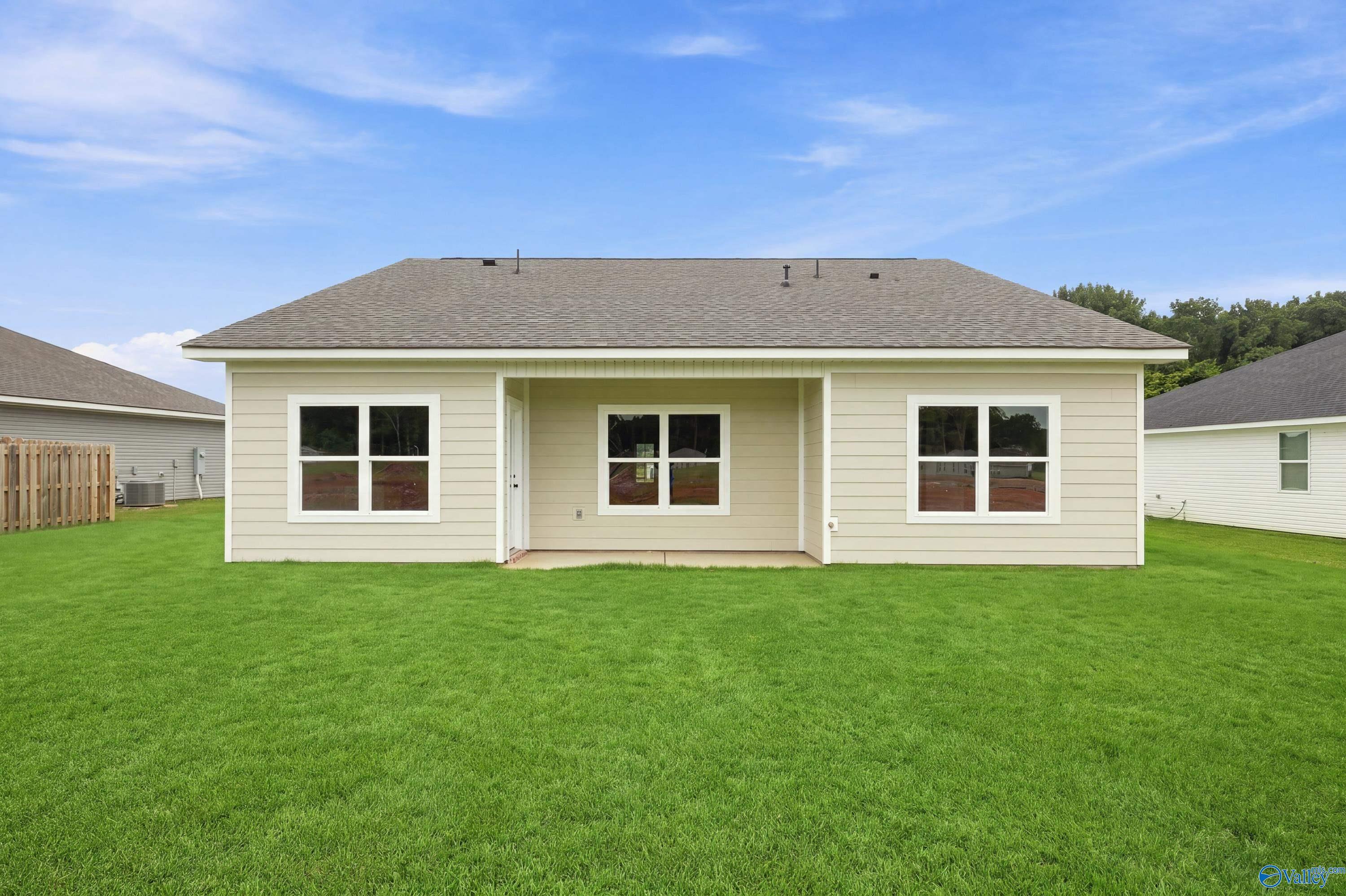 Back exterior view of The Asheville E floor plan by Davidson Homes in Forest Glen, Hazel Green, Alabama.