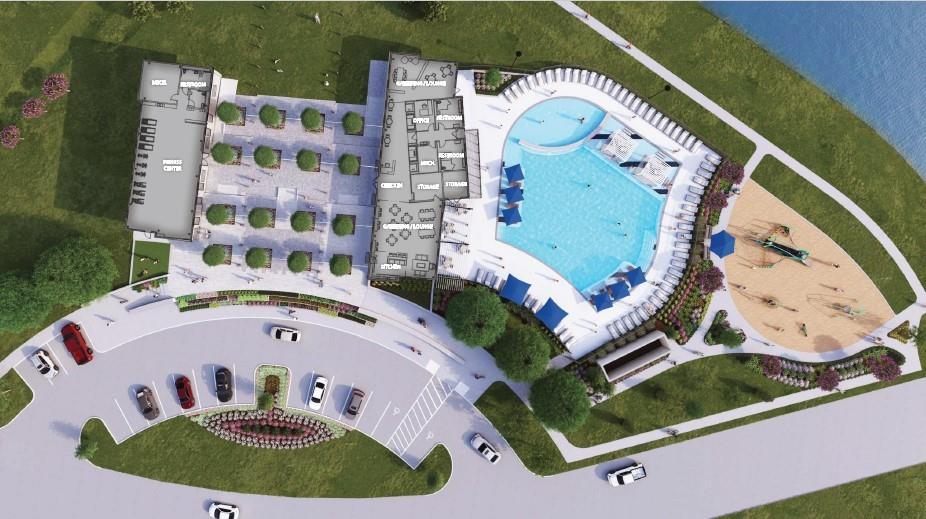 Aerial view of Sundance Cove amenity center with resort-style pool, clubhouse, fitness center and playground in Crosby, Texas