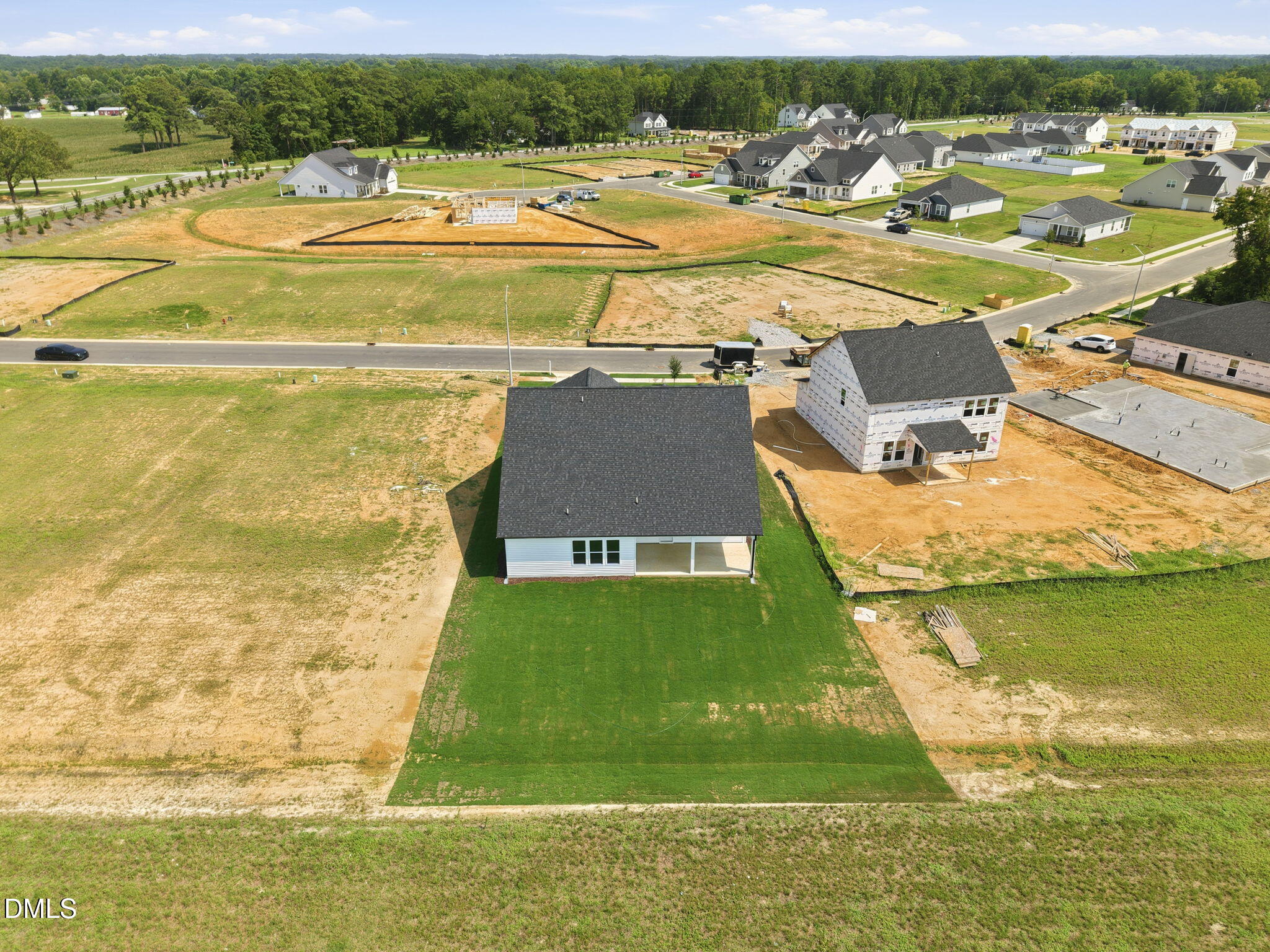 Aerial view of The Magnolia B home by Davidson Homes in Retreat at North Main, Lillington, North Carolina.