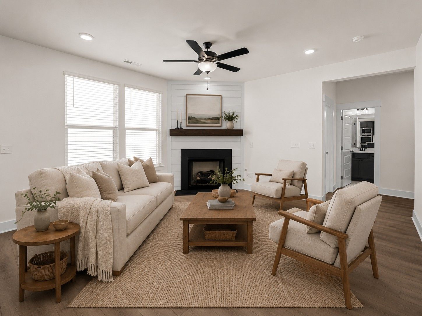 Modern living room with fireplace and shiplap in The Willow floor plan by Davidson Homes, Woods Crossing, Gallatin, TN.