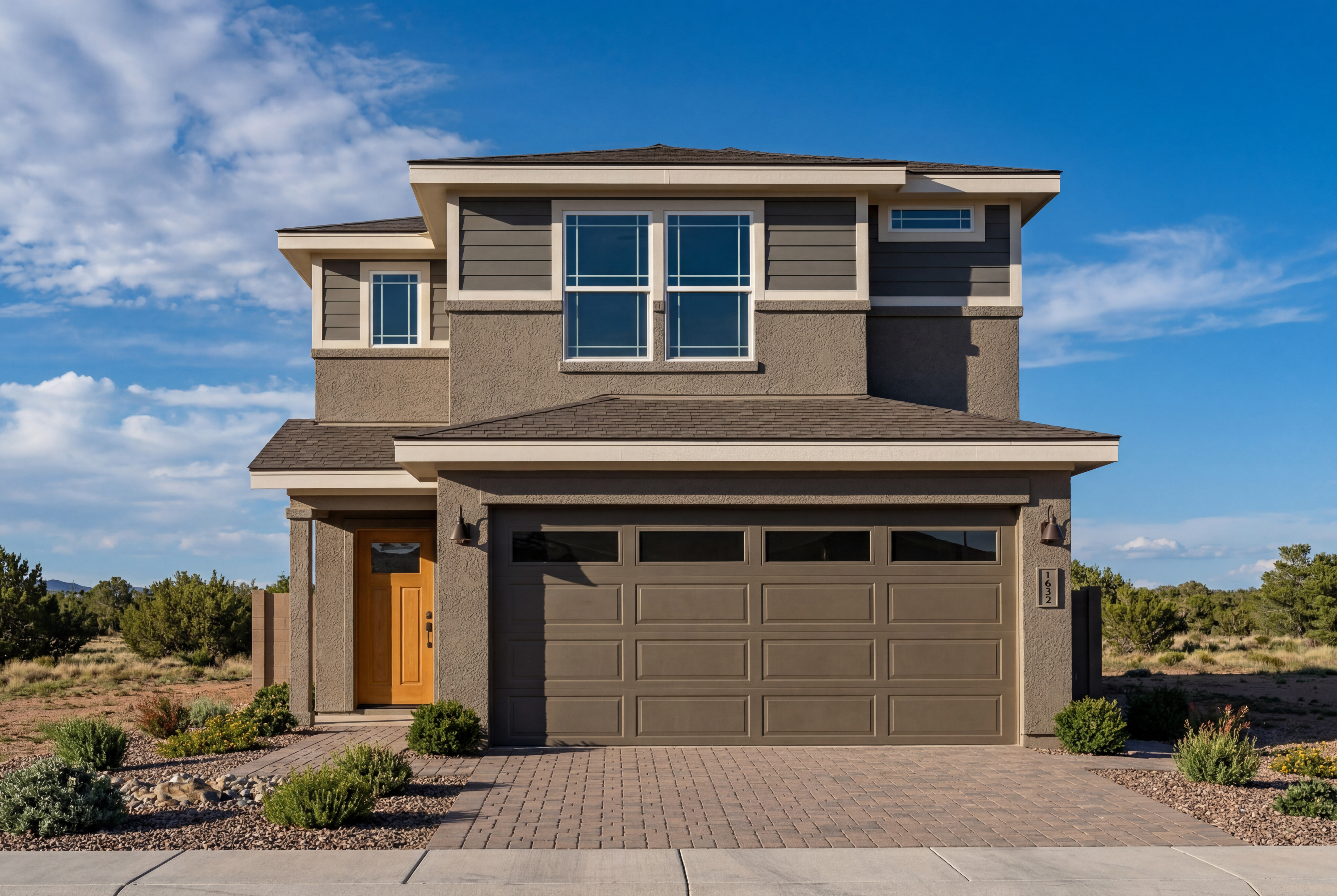Two-story exterior elevation of The Augusta A by Davidson Homes featuring a modern stucco facade and multi-car garage.