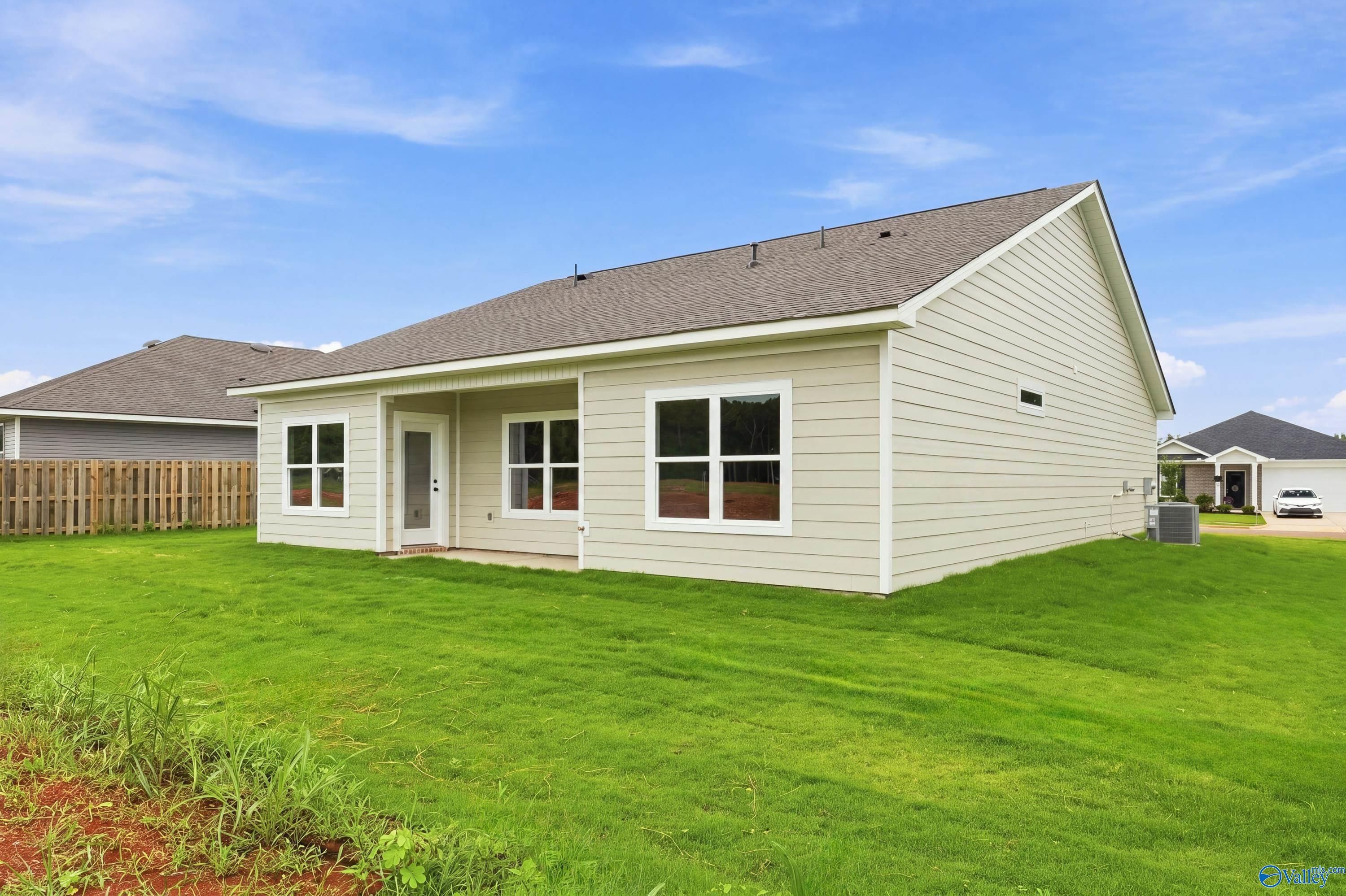 Back exterior view of The Asheville E floor plan by Davidson Homes in Forest Glen, Hazel Green, Alabama.