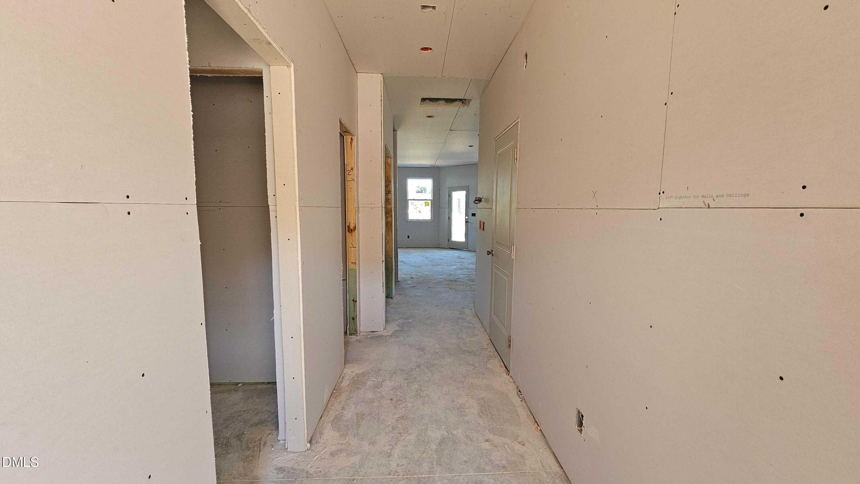 Interior hallway under construction in The Graham floor plan by Davidson Homes in Springvale, Fuquay-Varina, North Carolina.