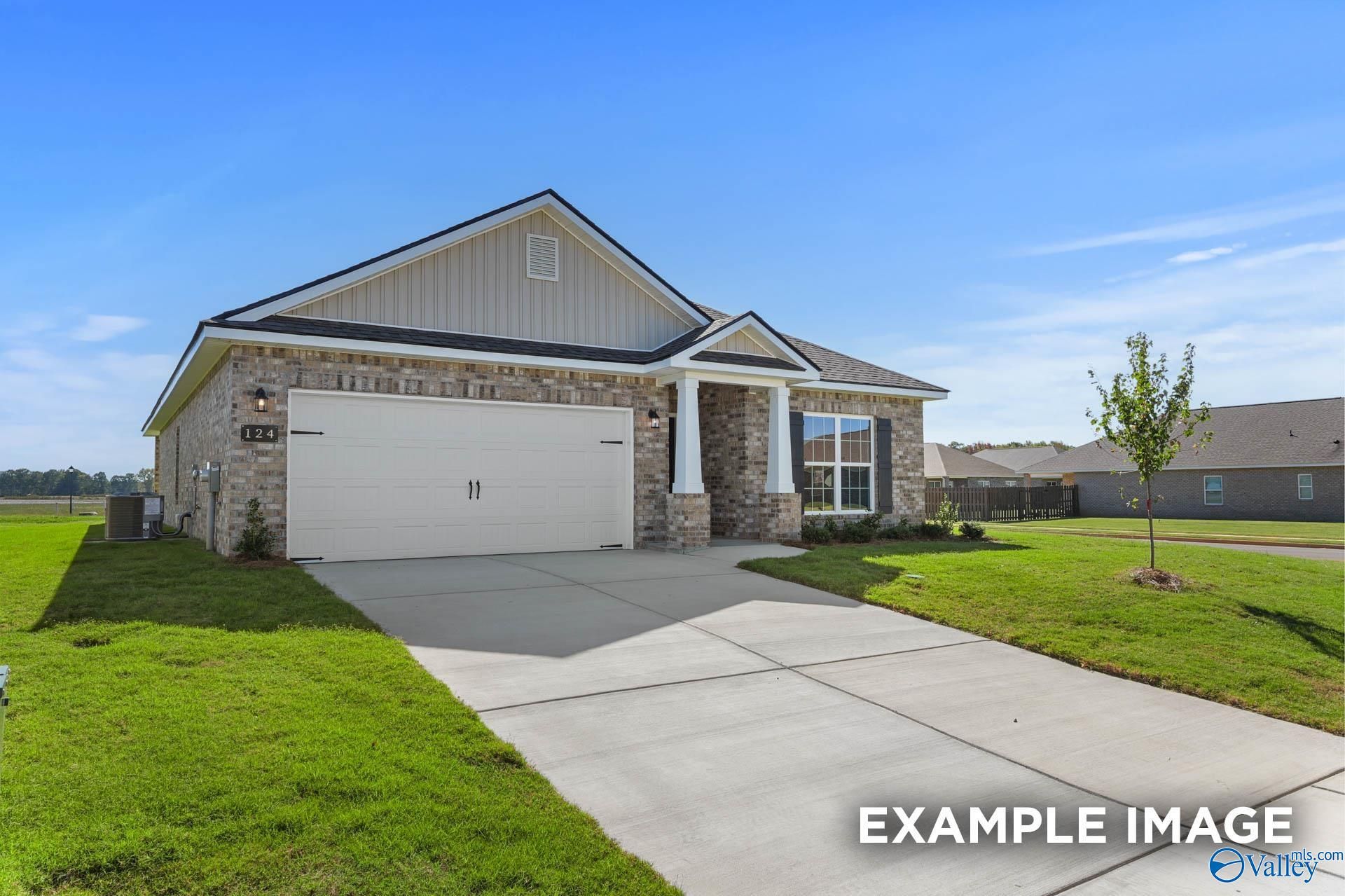 Modern 1-story 4-bedroom home with 2-car garage, stone columns, and front porch in Ricketts Farm, Athens, Alabama by Davidson Homes The Daphne C
