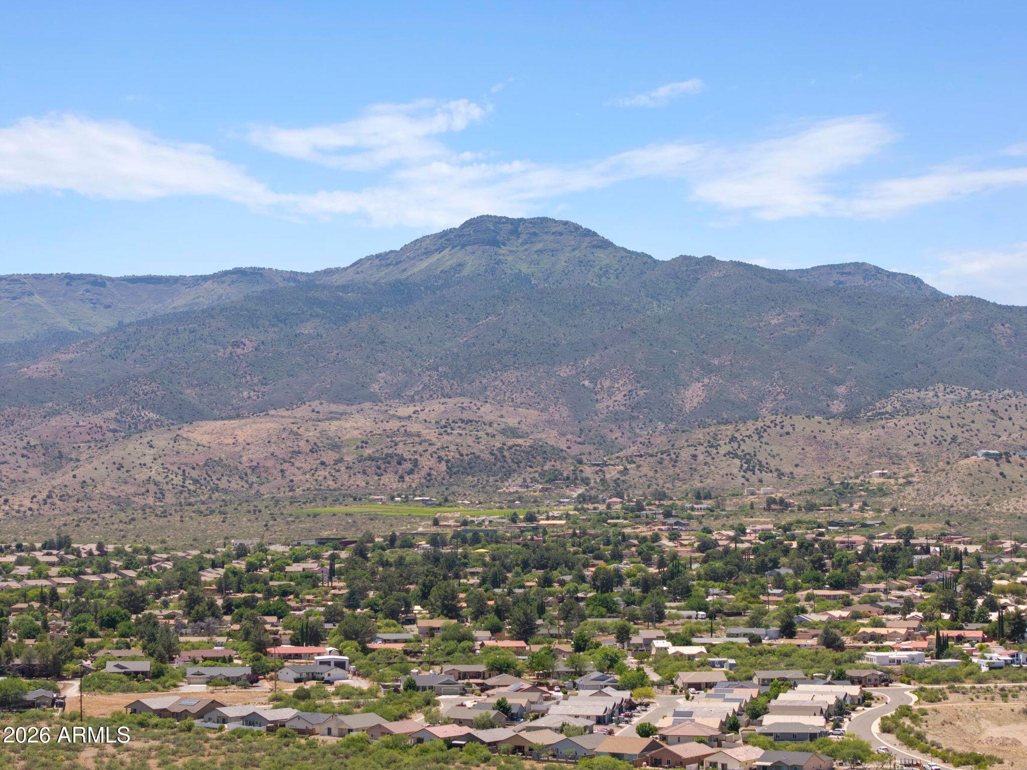 Panoramic view of Vineyards at Cottonwood community nestled against scenic mountains in Cottonwood, Arizona.