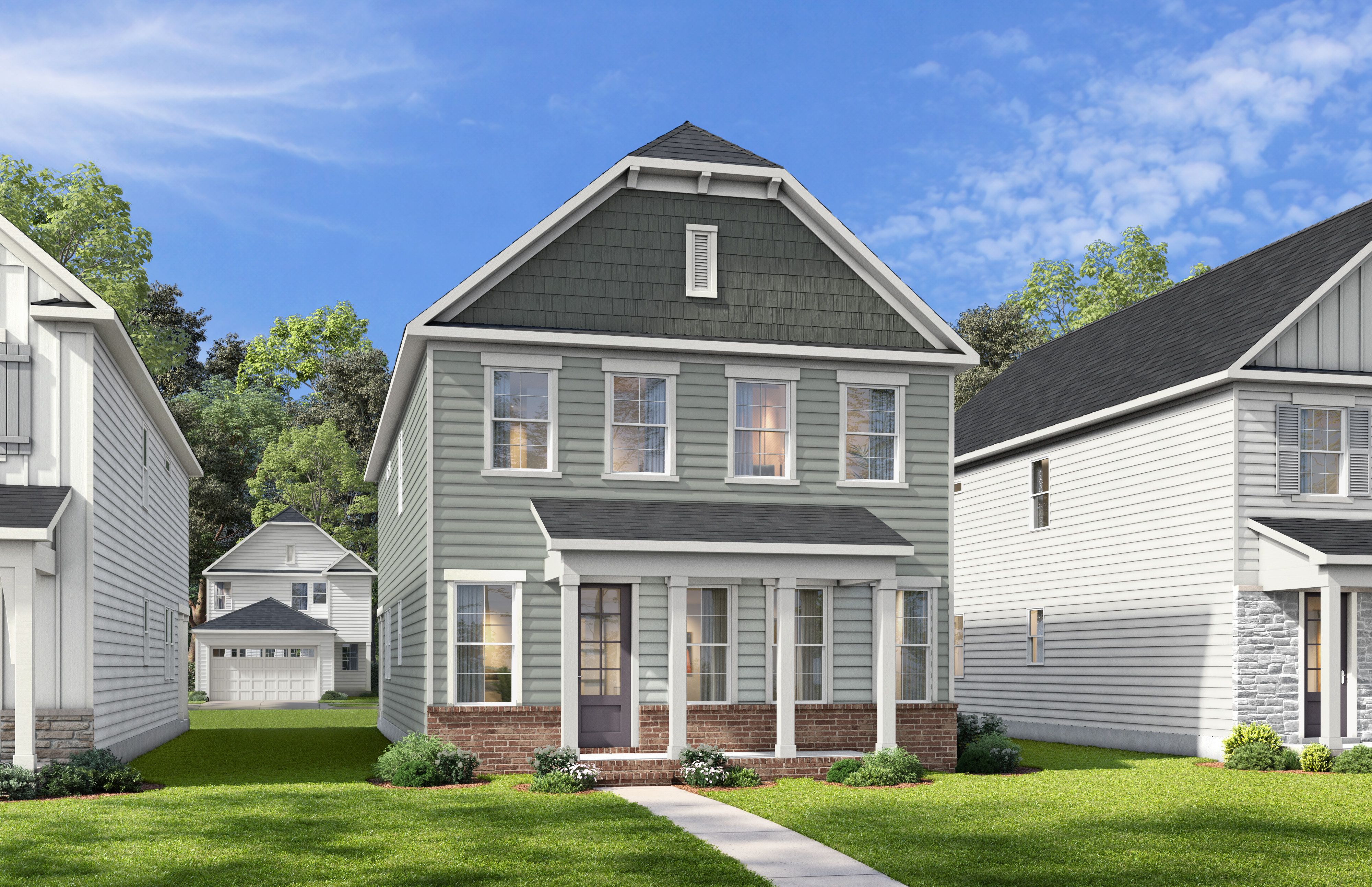Two-story exterior elevation of The Harris A by Davidson Homes featuring gray siding and brick accents in Knightdale, NC.