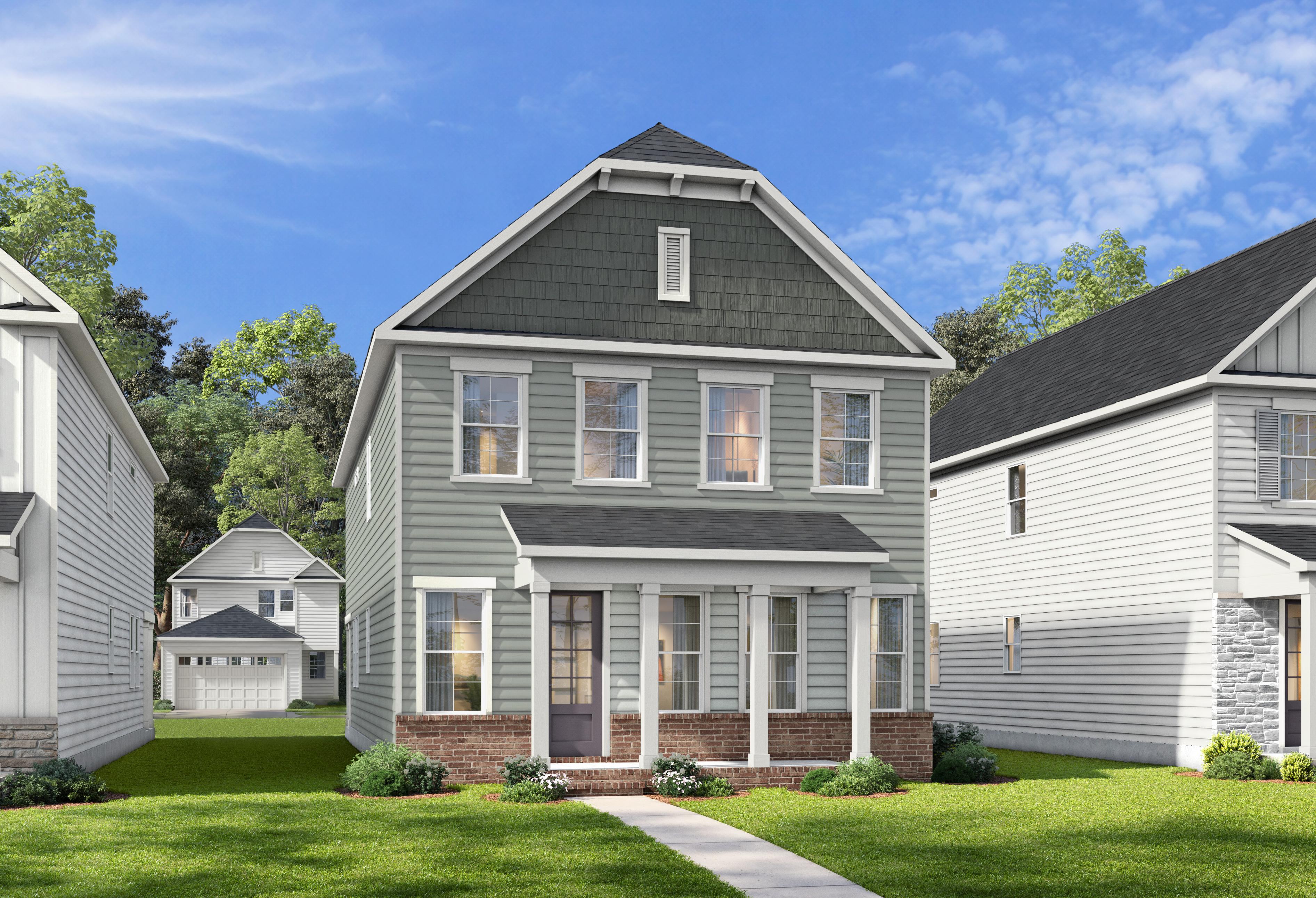 Two-story exterior elevation of The Harris A by Davidson Homes featuring gray siding and brick accents in Knightdale, NC.