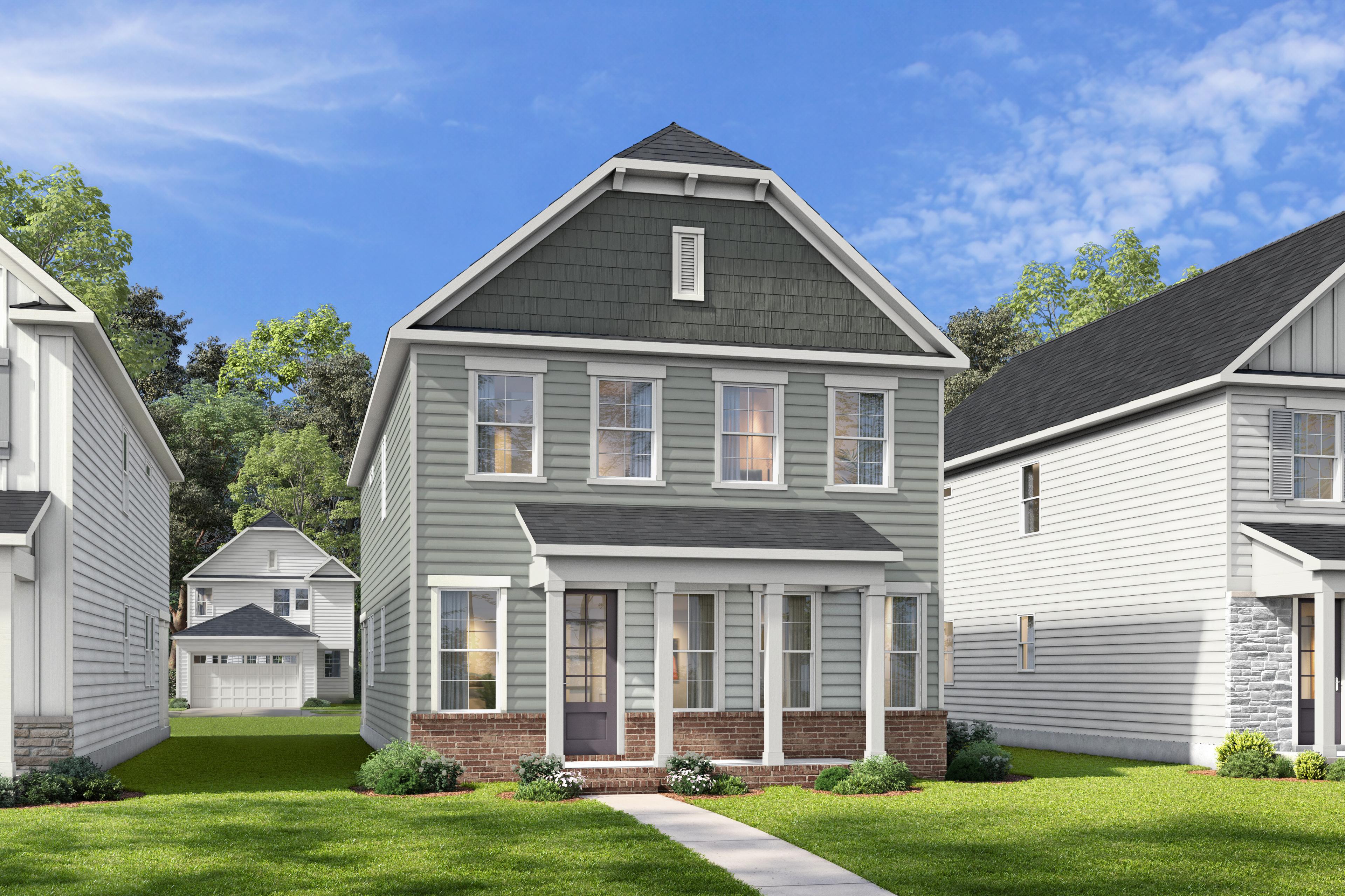 Two-story exterior elevation of The Harris A by Davidson Homes featuring gray siding and brick accents in Knightdale, NC.