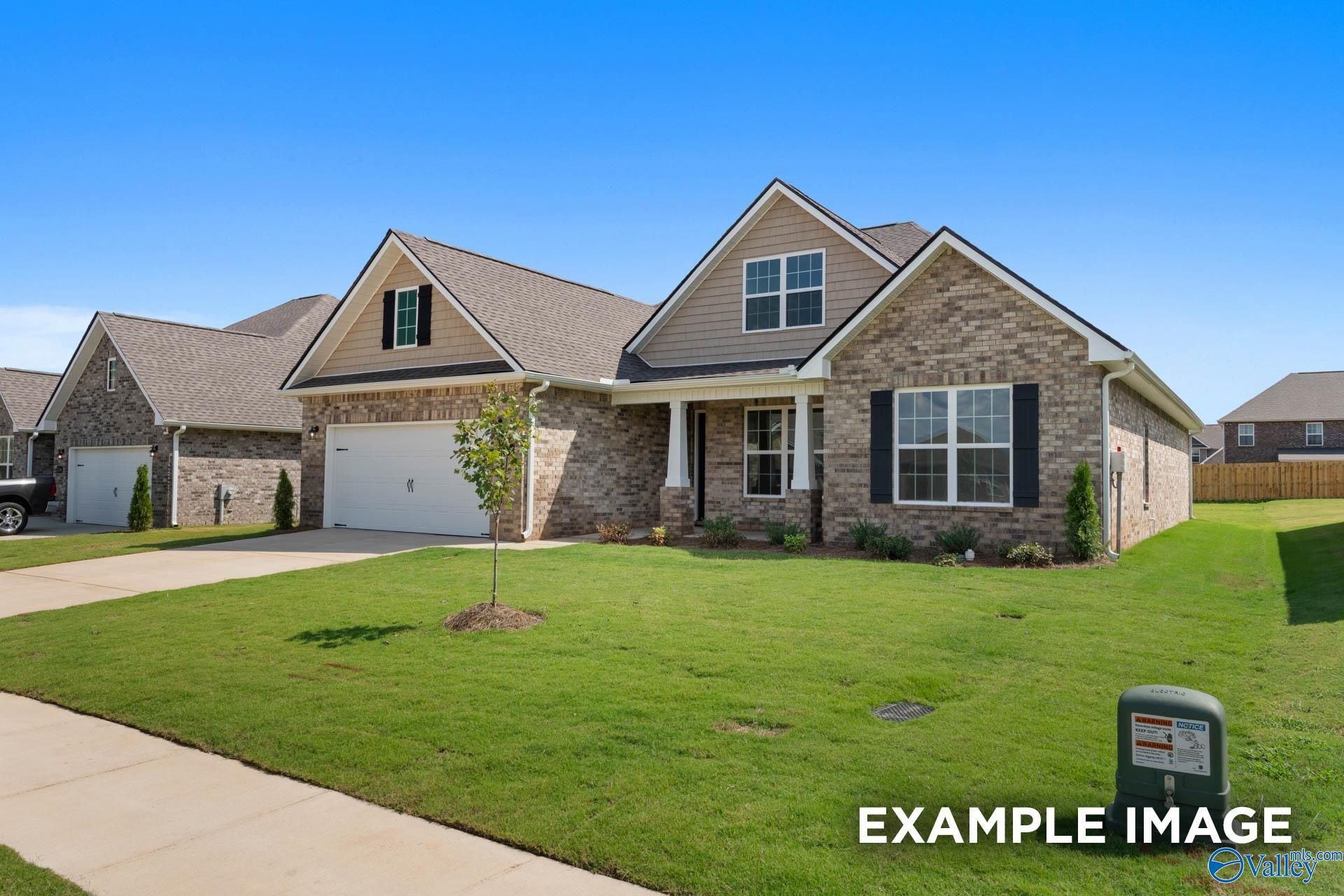 The Rockford B floor plan by Davidson Homes featuring brick exterior and 2-car garage in Kendall Downs, Toney, Alabama.