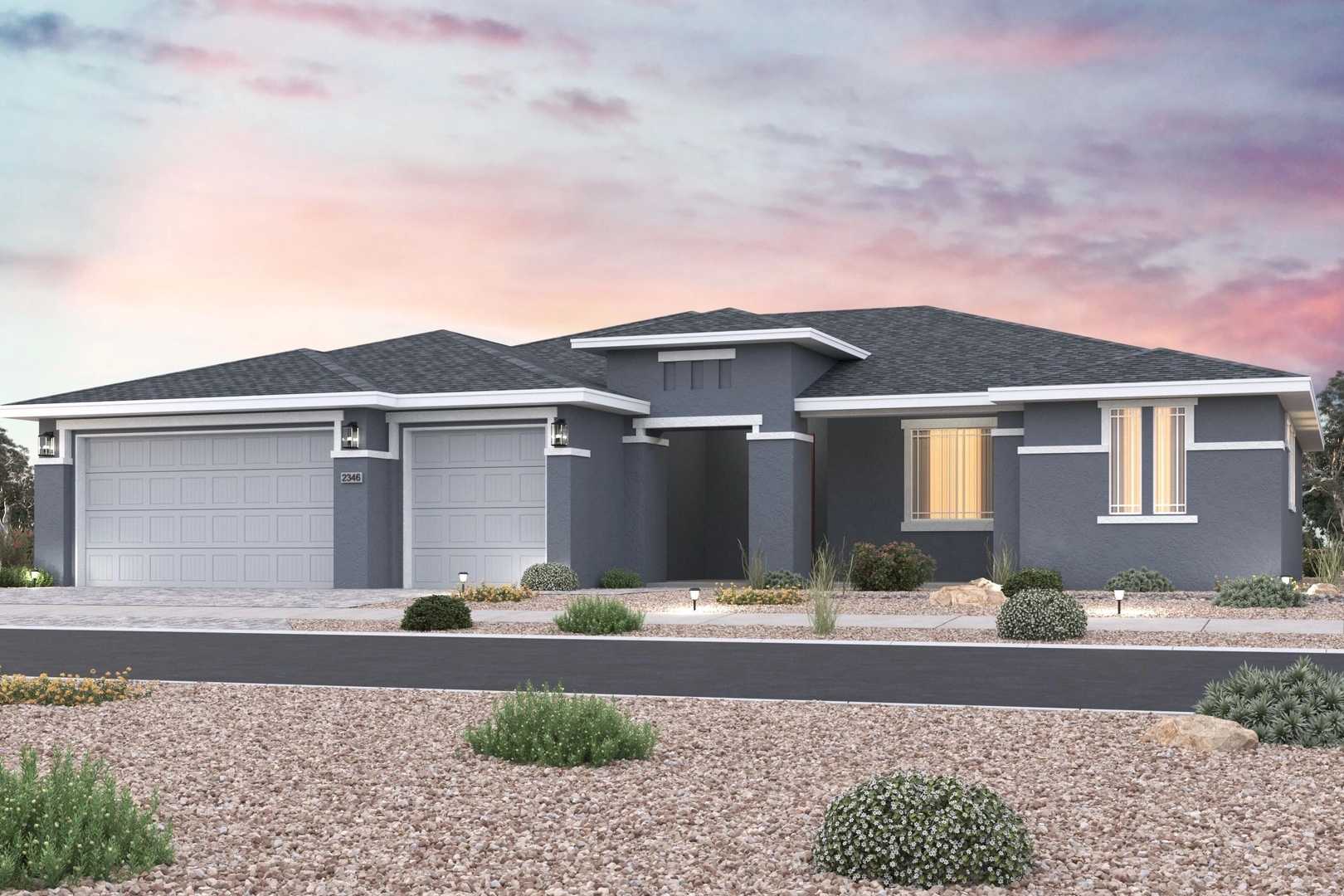 Modern gray exterior of The Monarch single-story home with 3-car garage, desert landscaping, and Prescott Valley sunset sky