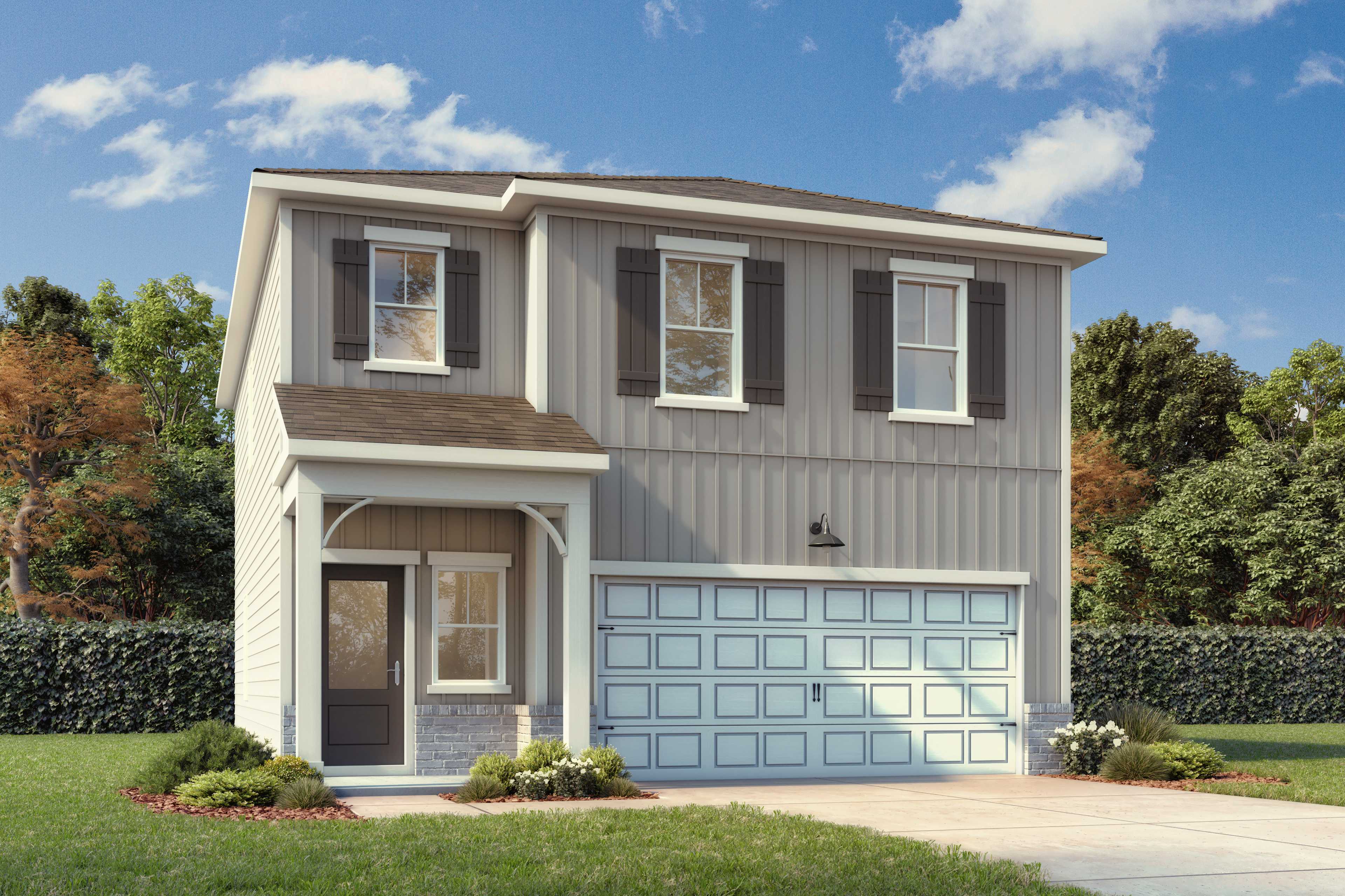 Front exterior of a 2 story home with front patio and 2 car garage