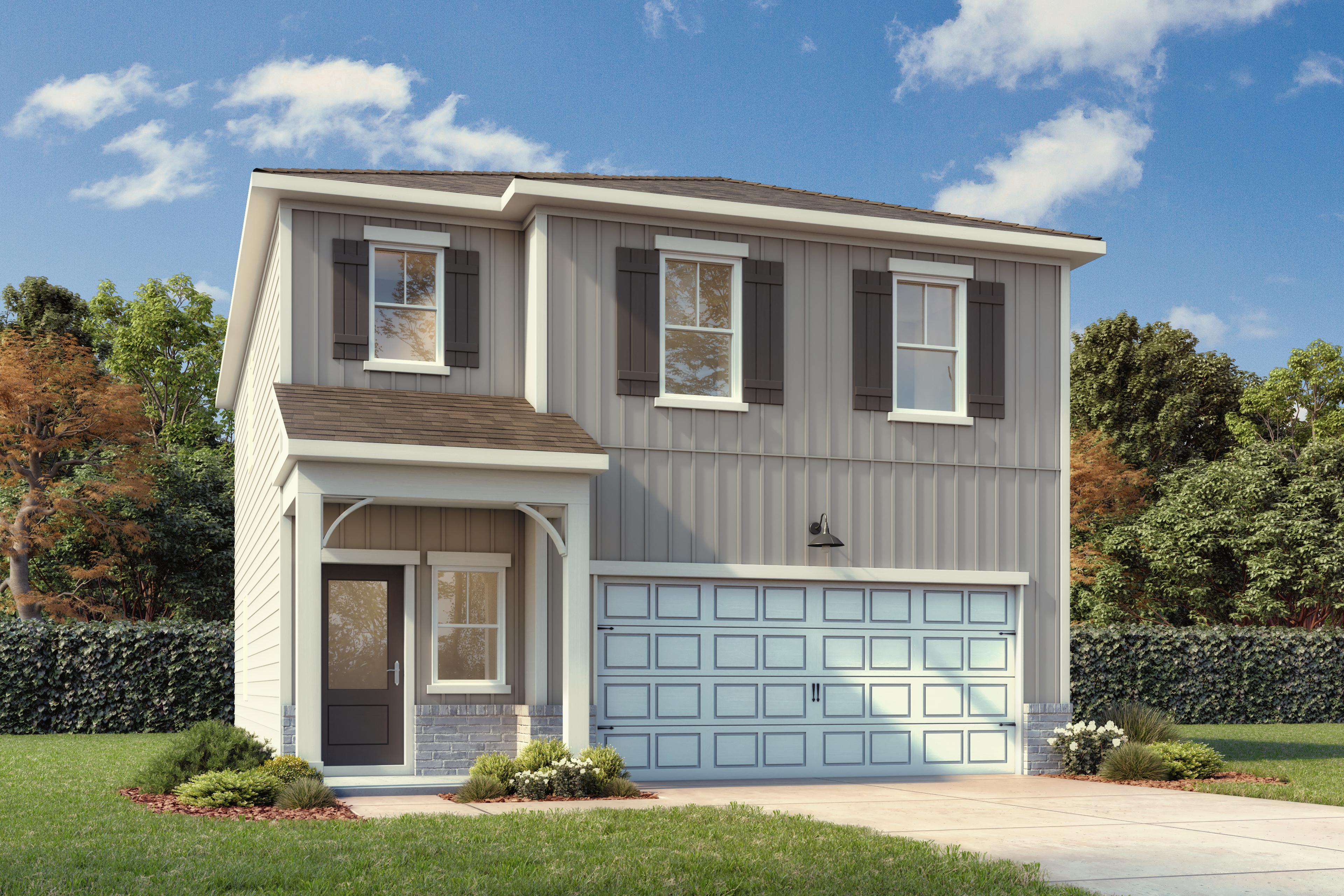 Front exterior of a 2 story home with front patio and 2 car garage