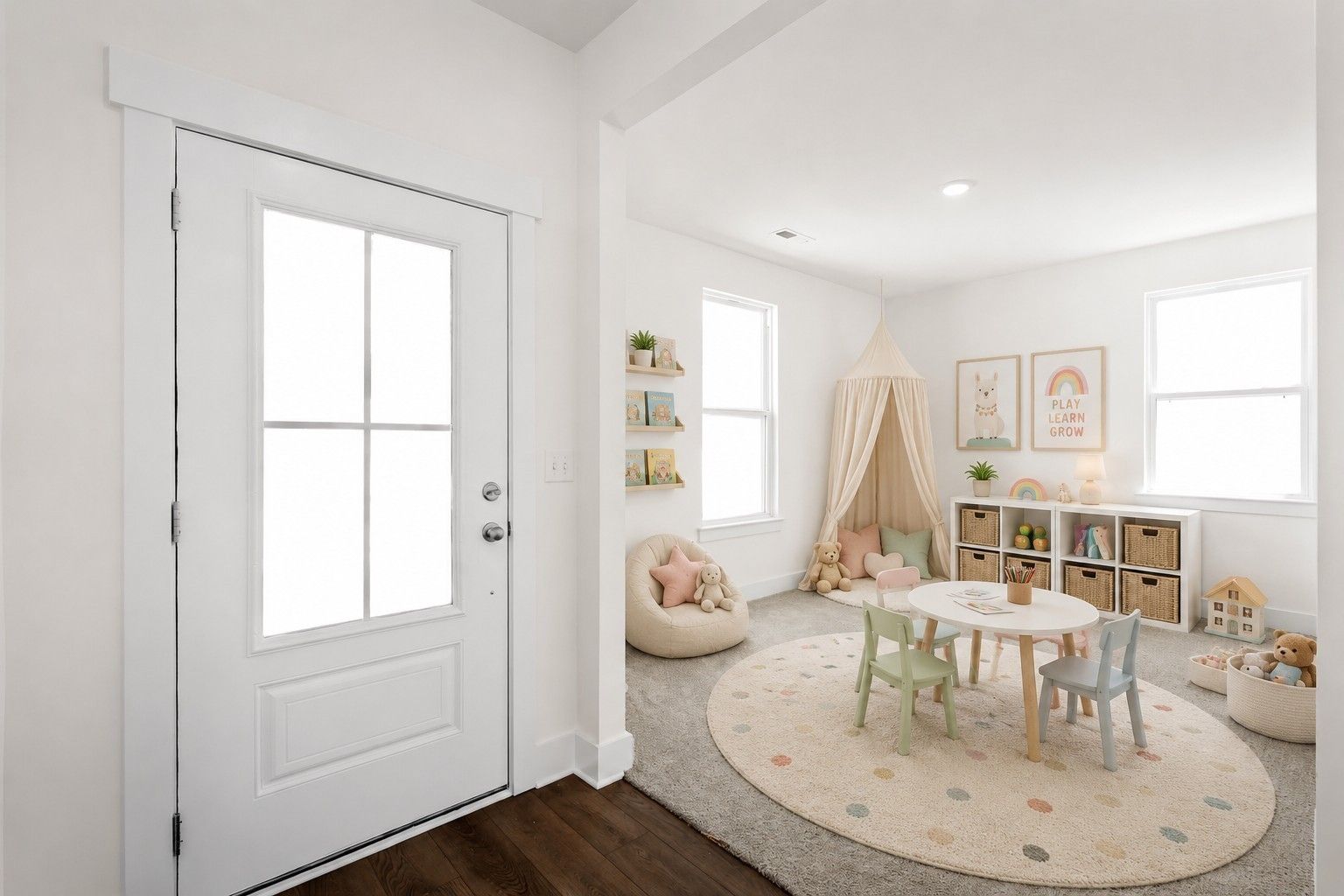 Bright playroom with kids' table, canopy nook, and glass-panel front door in Davidson Homes Cottonwood E, Gallatin TN