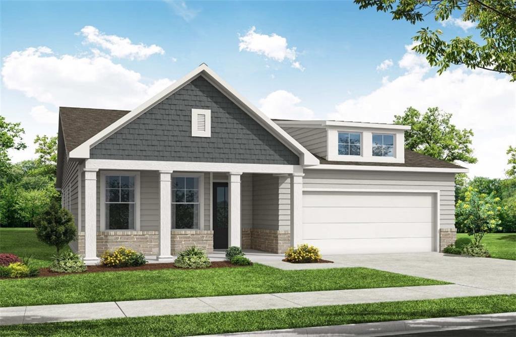 Modern single-story 3-bedroom home with gray shingle roof, covered porch, 2-car garage, and lush landscaping in Kelly Preserve, Loganville, Georgia