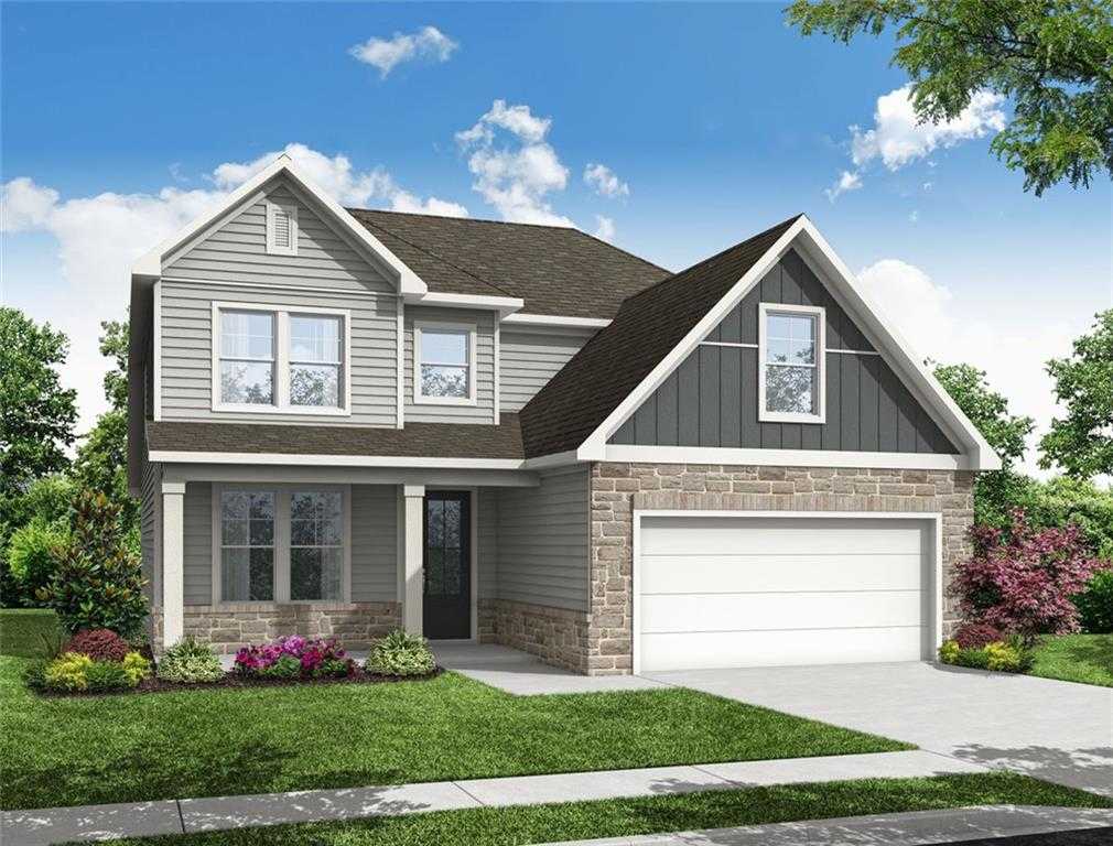 Modern 3-story Davidson Homes The Ash C with 3-car garage, stone facade, front porch, and lush landscaping in Wehunt Meadows, Hoschton, Georgia