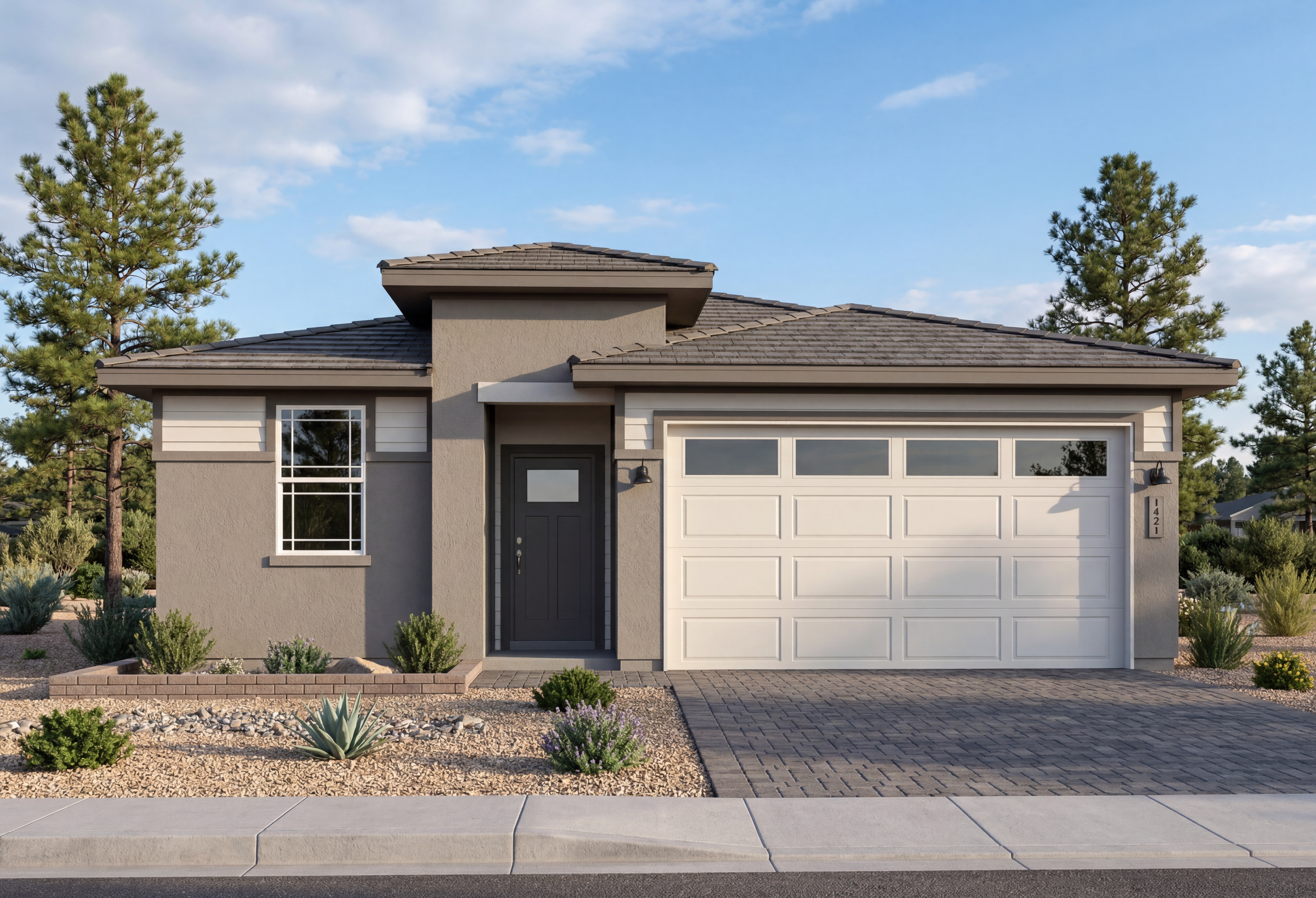 Modern single-story exterior of The Coronado in Prescott, Arizona, featuring a two-car garage and desert landscaping.