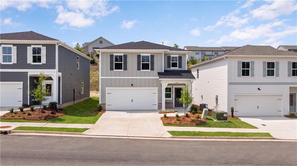 Two-story, 3-bedroom, 2.5-bath Hartwell C craftsman home by Davidson Homes in The Bluffs, Canton, Georgia.