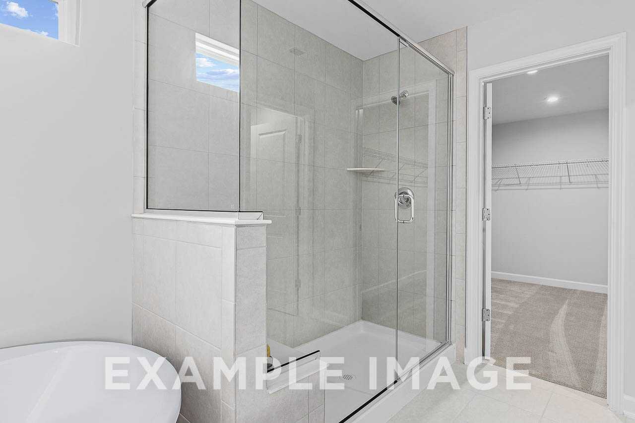 Davidson Homes The Chestnut Plan Master Bathroom with Walk-In Shower near Walk-In Closet and Bathtub