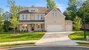 Two-story Danbury C floor plan by Davidson Homes featuring 5 bedrooms and a 3-car garage in Melody Lakeside Estates, Buford.