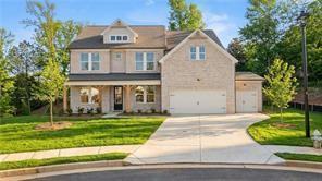 Two-story Danbury C floor plan by Davidson Homes featuring 5 bedrooms and a 3-car garage in Melody Lakeside Estates, Buford.