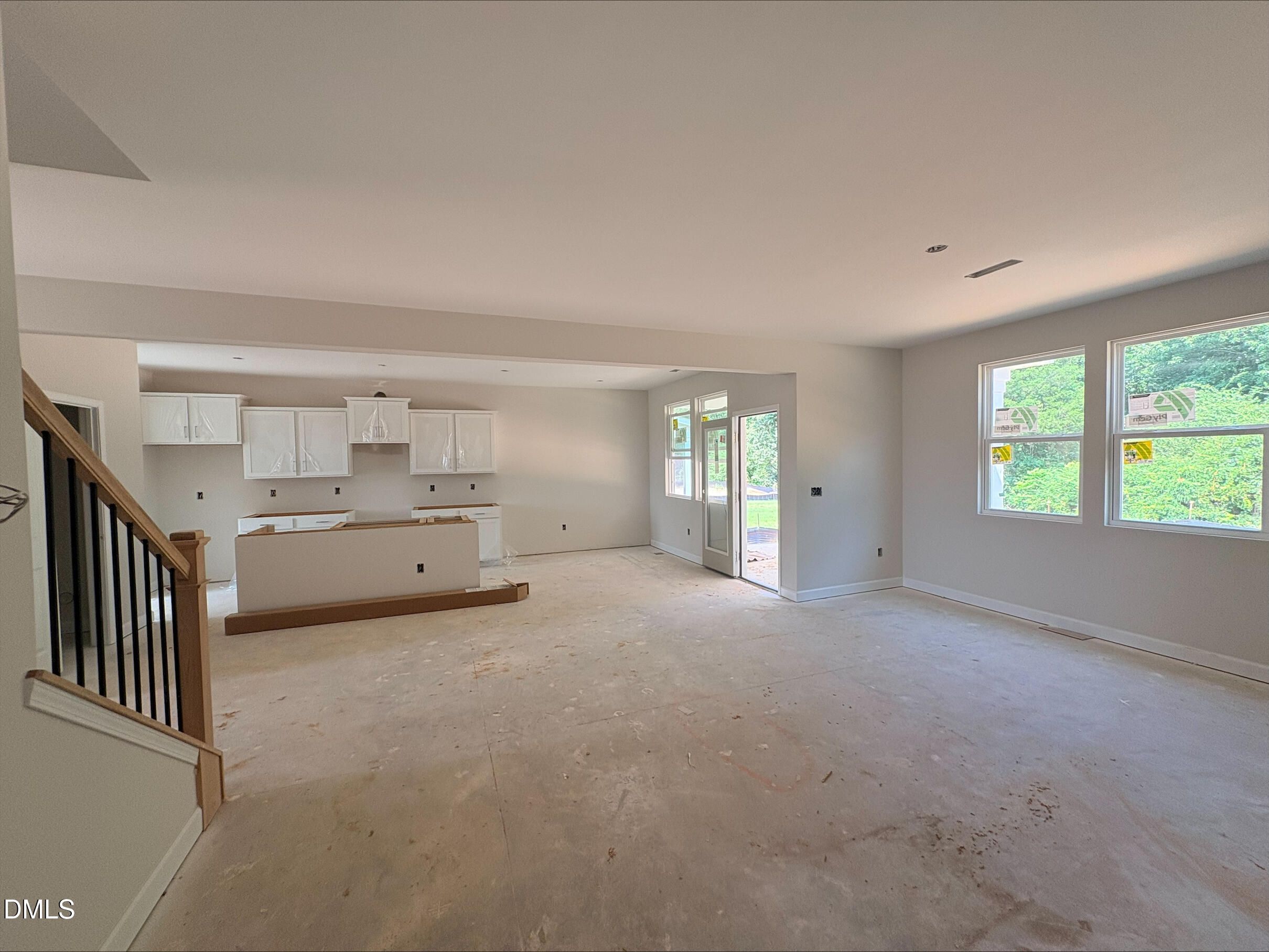 Open-concept kitchen and living area in The Willow C floor plan at Woodland Crossing, Zebulon, North Carolina.