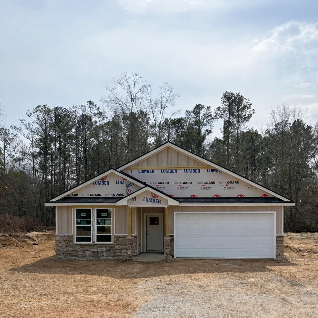 New construction 4-bedroom single-story home frame with 2-car garage and gable roof in Silver Oak, Cusseta, Alabama by Evermore Homes The Aurora B