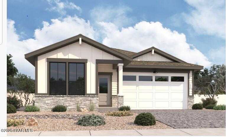 Modern single-story Nantucket B home with 3-car garage, large windows, and desert landscaping in Prescott, Arizona