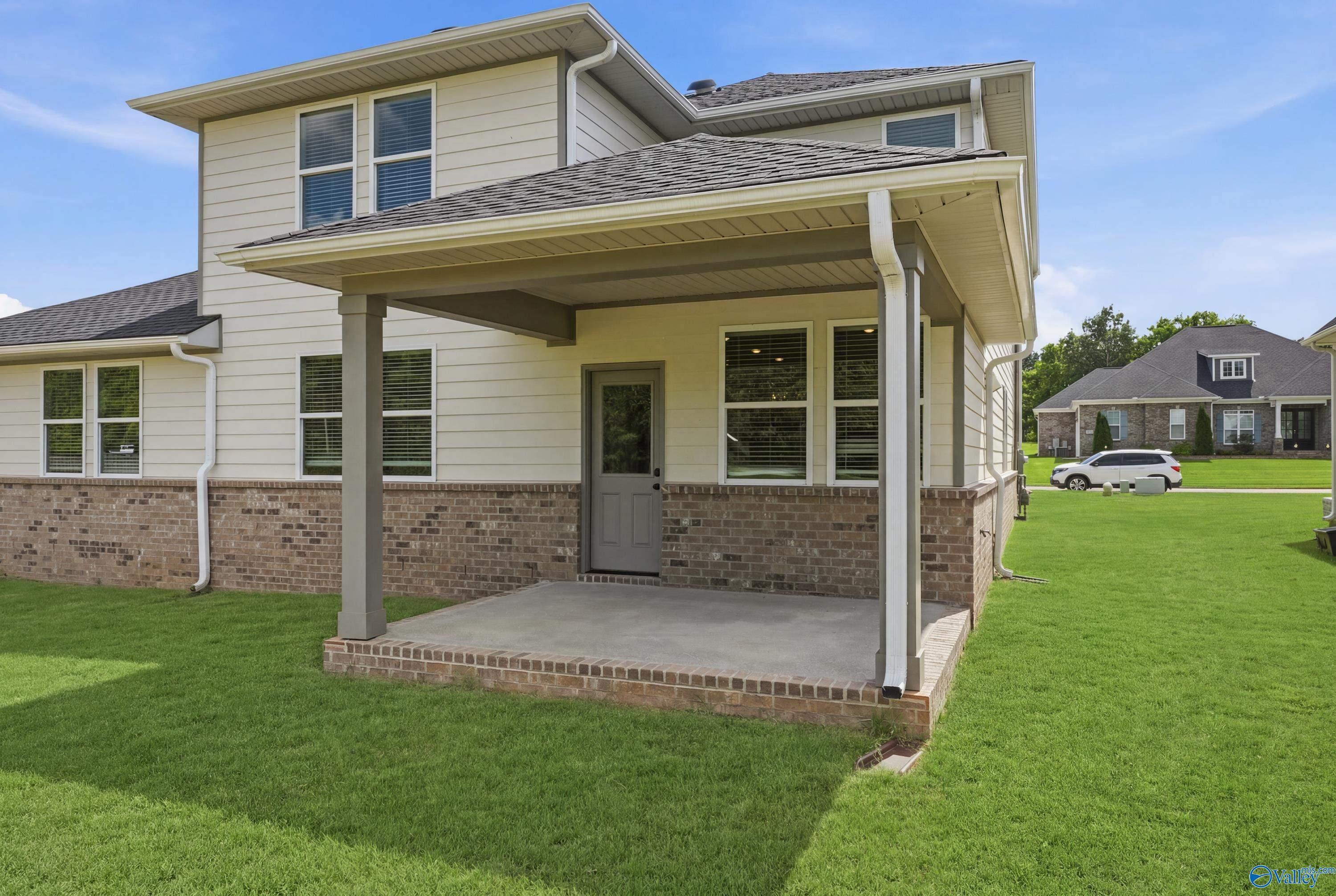 Covered back patio of The Dorado floor plan by Davidson Homes in Riverton Preserve, Huntsville, Alabama.