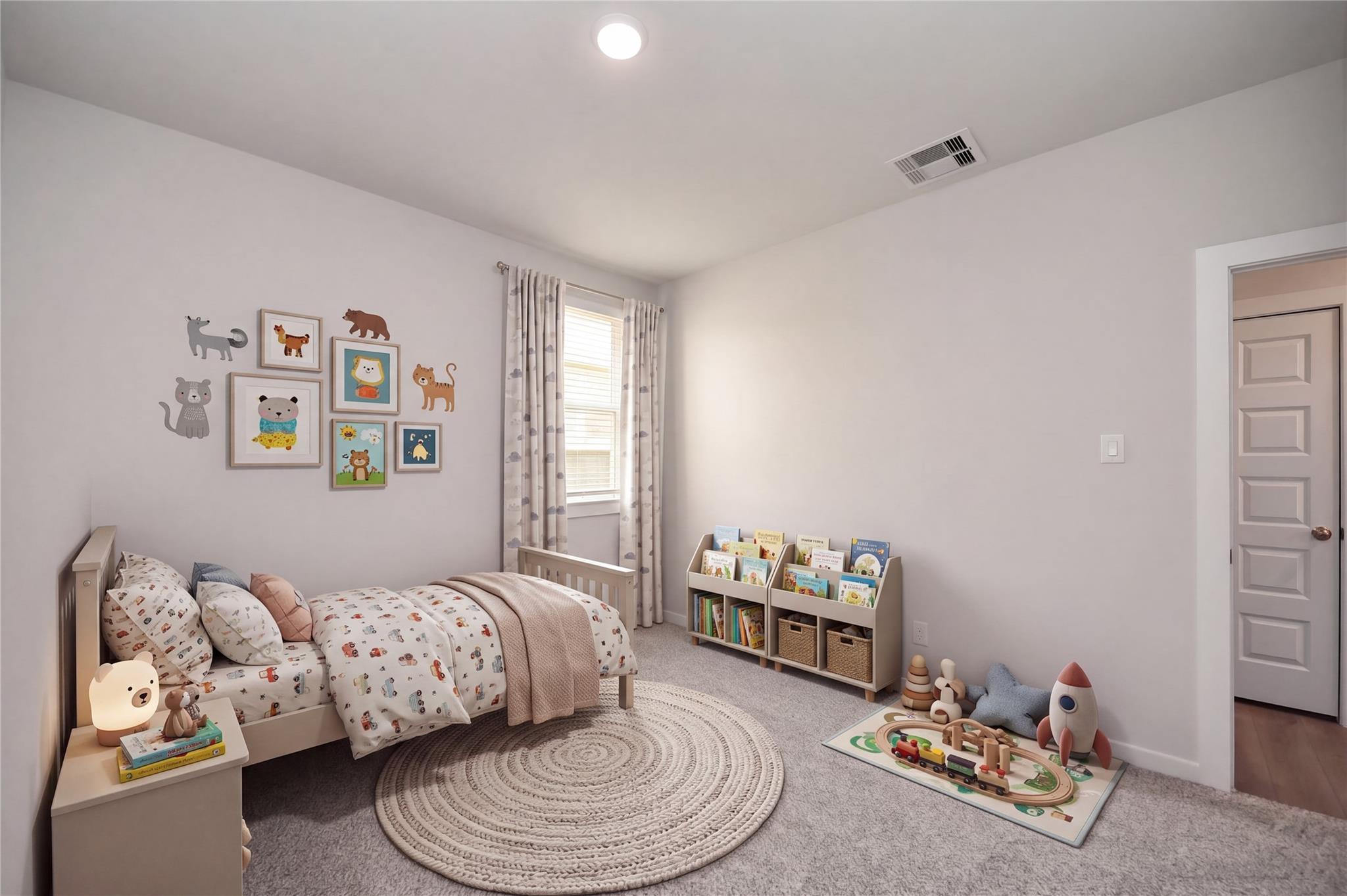 Cozy children's bedroom with twin bed, animal wall art, and toy storage in Davidson Homes The Frio F, Robins Landing, Houston