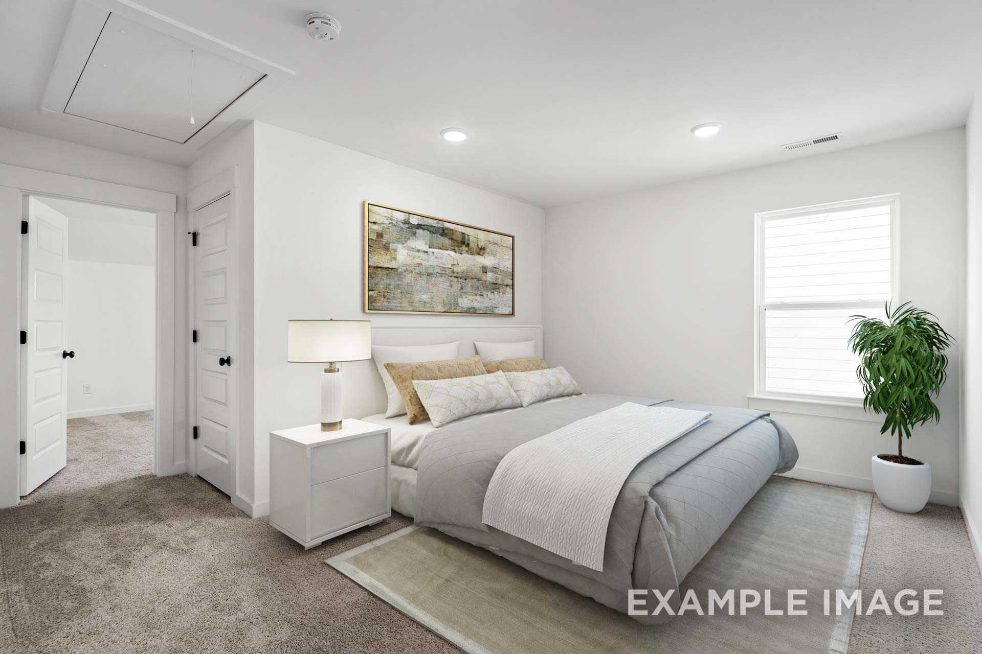 Spacious secondary bedroom in The Ash home with king bed, abstract wall art, nightstand lamp, and potted plant