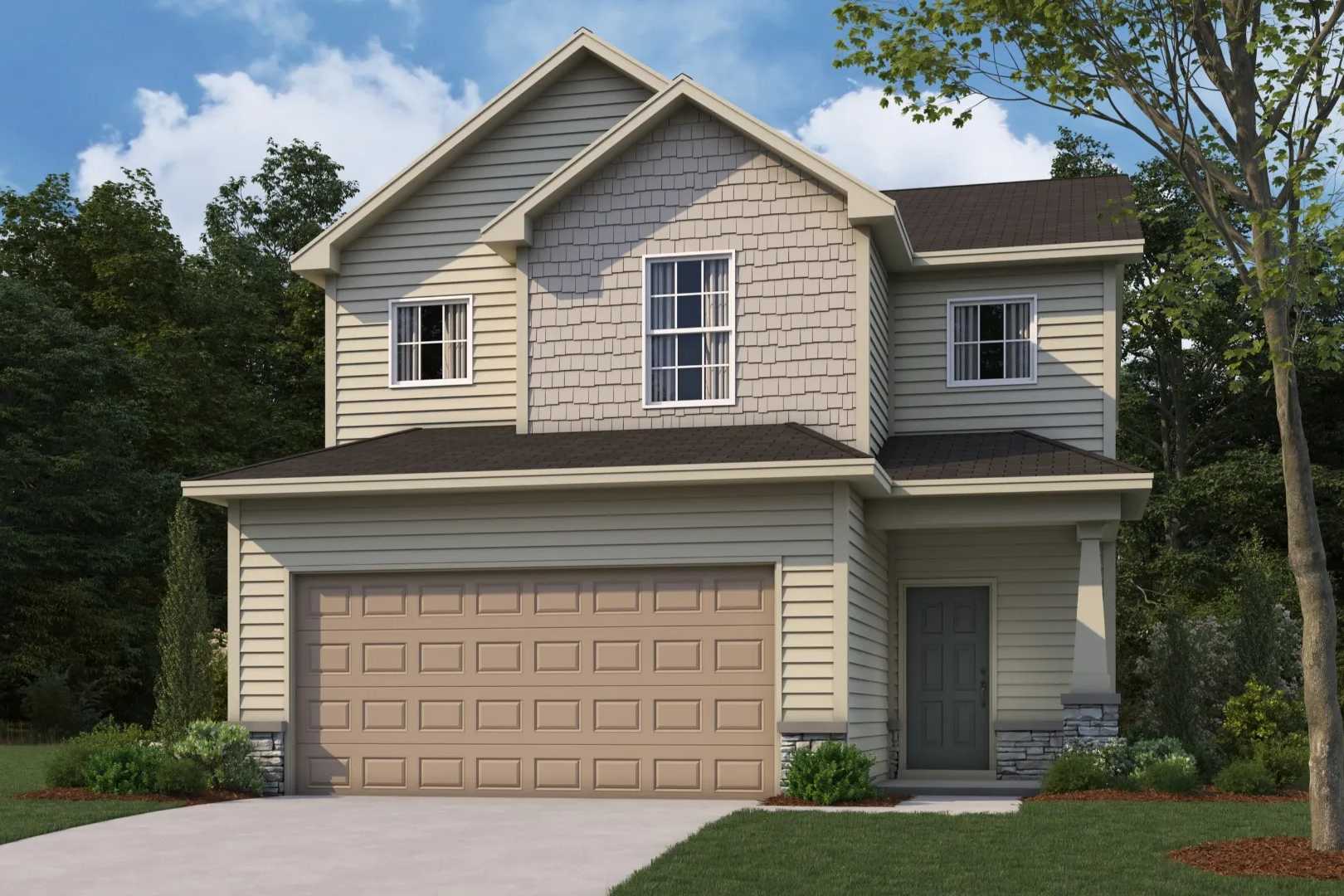 Two-story The Bartlett home elevation featuring beige siding, 2-car garage, and lush landscaping in Phenix City