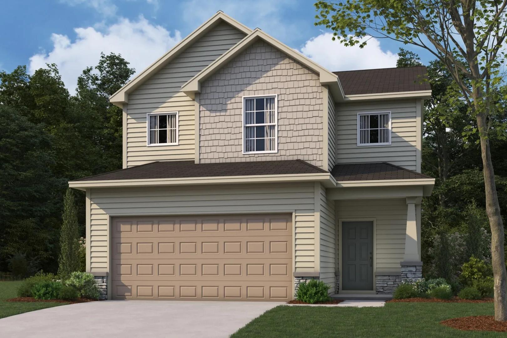 Two-story The Bartlett home elevation featuring beige siding, 2-car garage, and lush landscaping in Phenix City