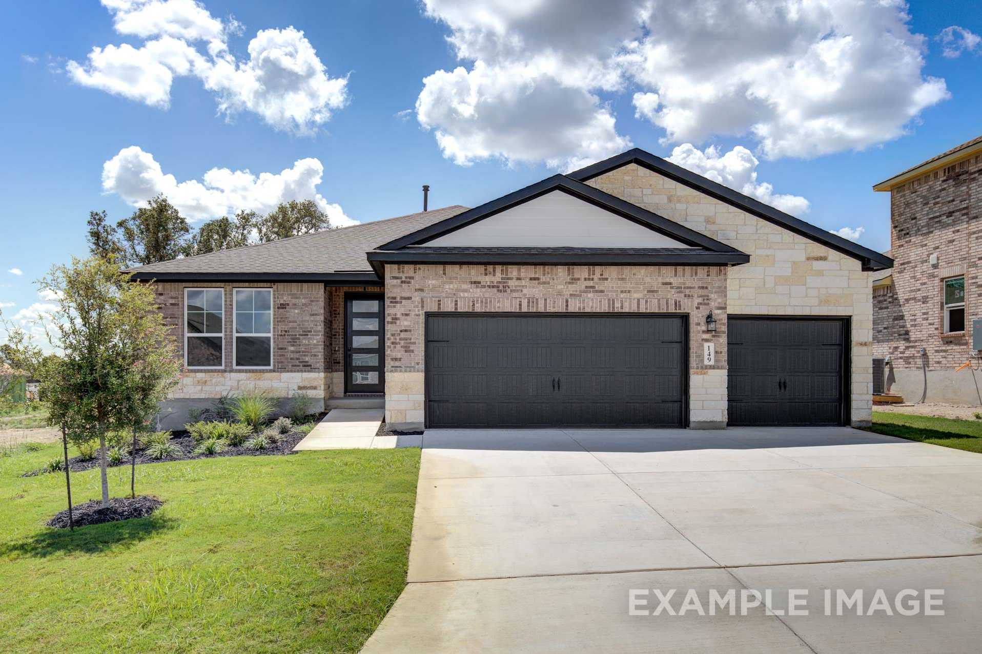 Modern Lanier G single-story home elevation with brick-stone facade, black 3-car garage, and landscaped front yard in San Antonio