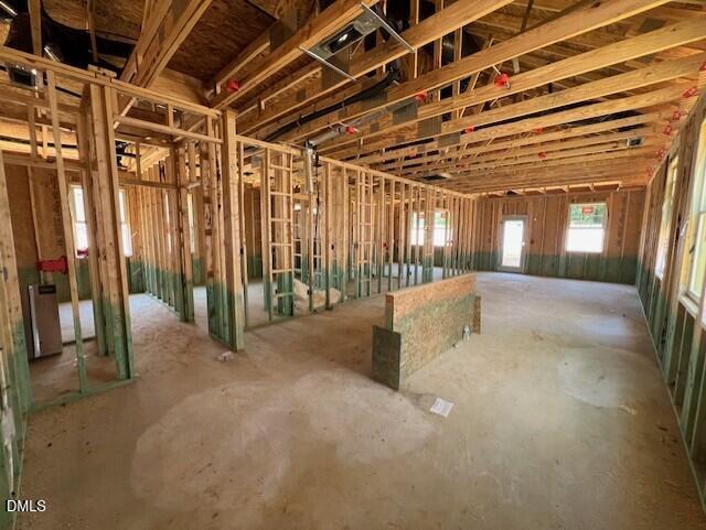 Open-concept interior construction framing for The Carter A floor plan at Gregory Village in Lillington, North Carolina.
