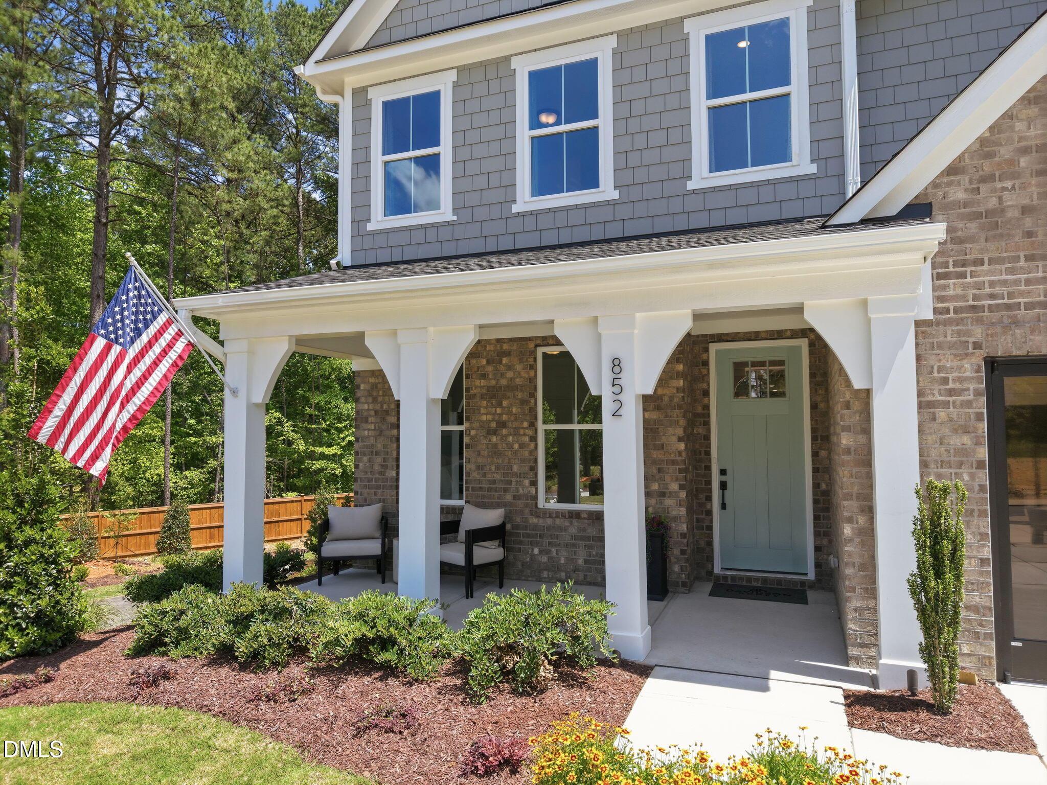 Front porch of The Ashport M floor plan by Davidson Homes in Wendell Ridge, Wendell, North Carolina.