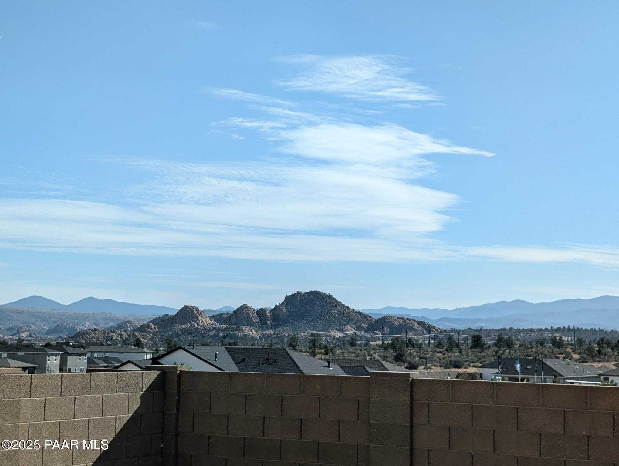 Breathtaking Prescott Arizona mountain vista from backyard of 3-bedroom Davidson Homes Sheridan II F in South Ranch Western Collection