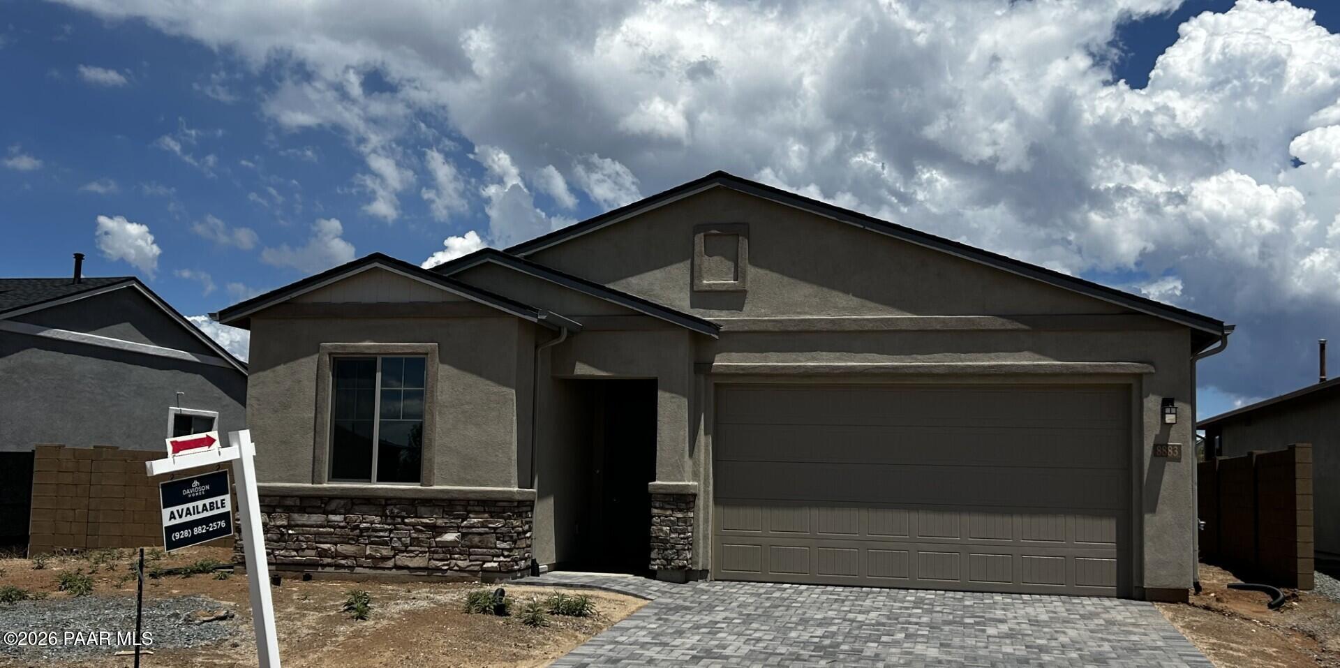 Single-story Frontier A floor plan by Davidson Homes with 3-car garage in North Ridge at Pronghorn Ranch, Prescott Valley.