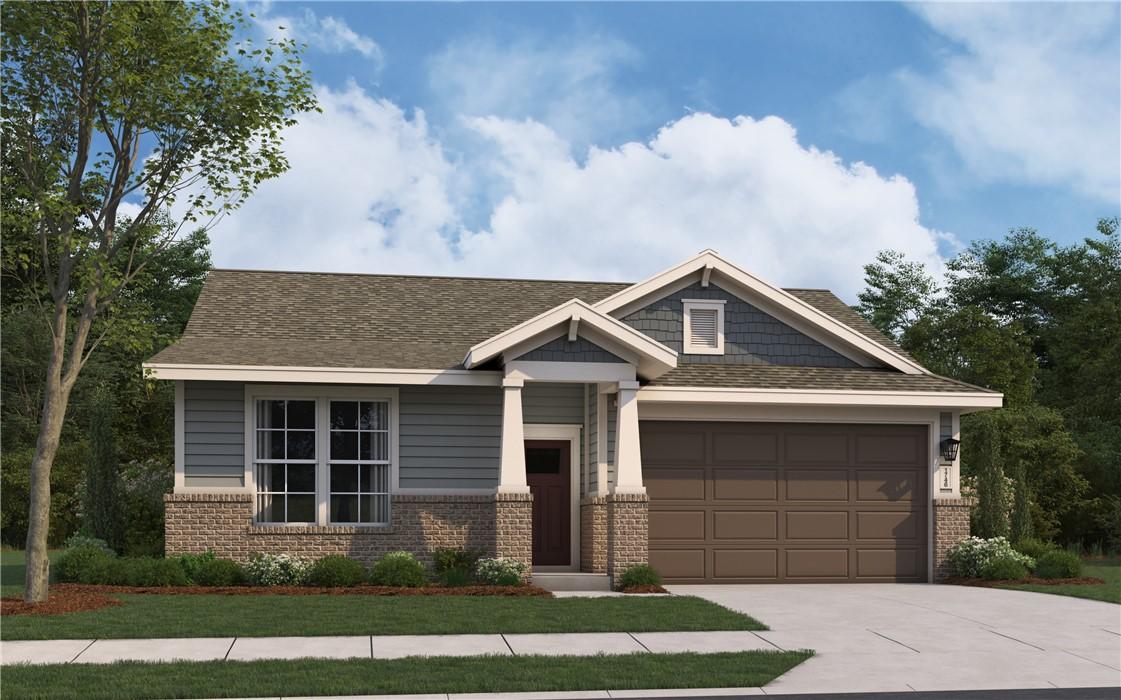 Modern single-story 3-bedroom home with brick base, gray siding, 2-car garage, and landscaped yard in Anderson Lakes, Opelika, Alabama