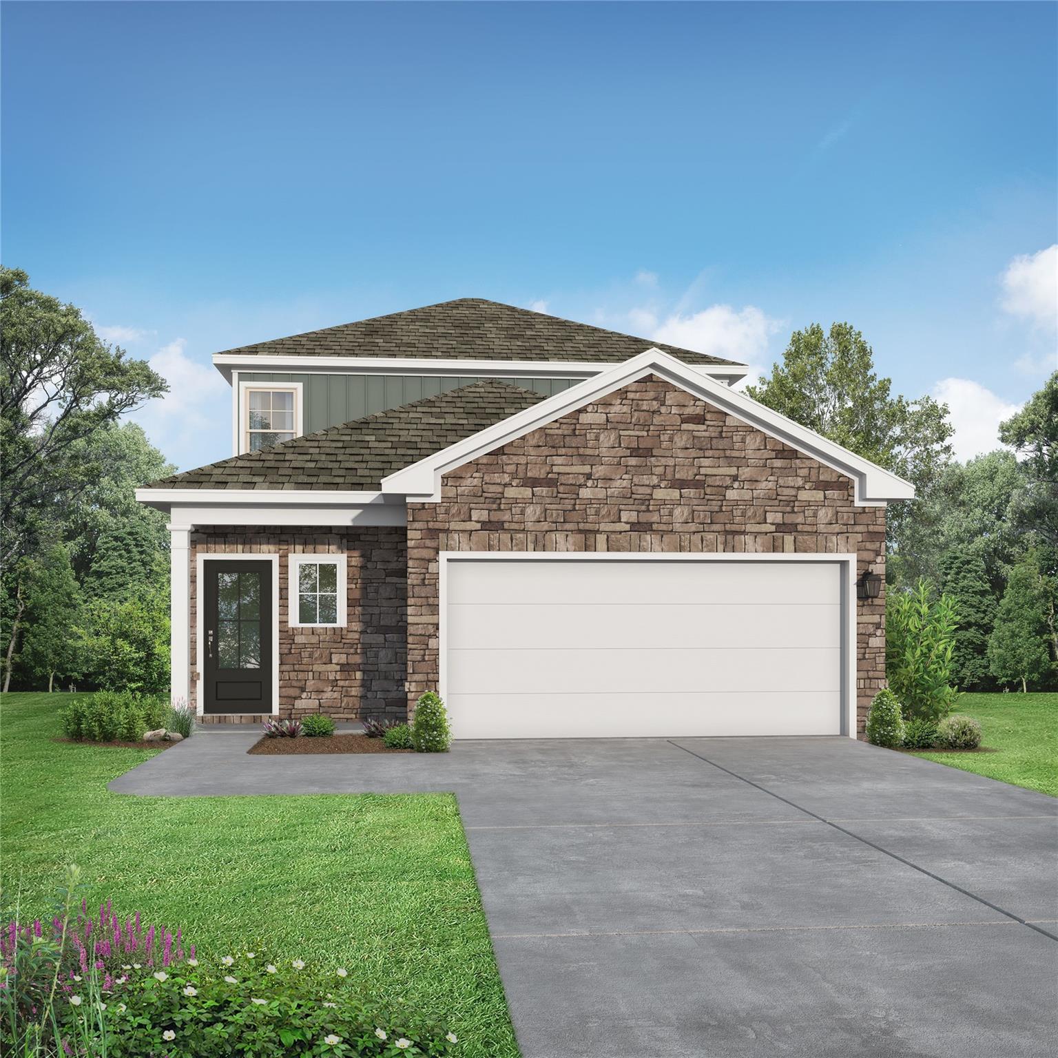 Two-story stone and siding exterior with 2-car garage at The Sabine E by Davidson Homes in Caney Creek Place, Conroe, Texas