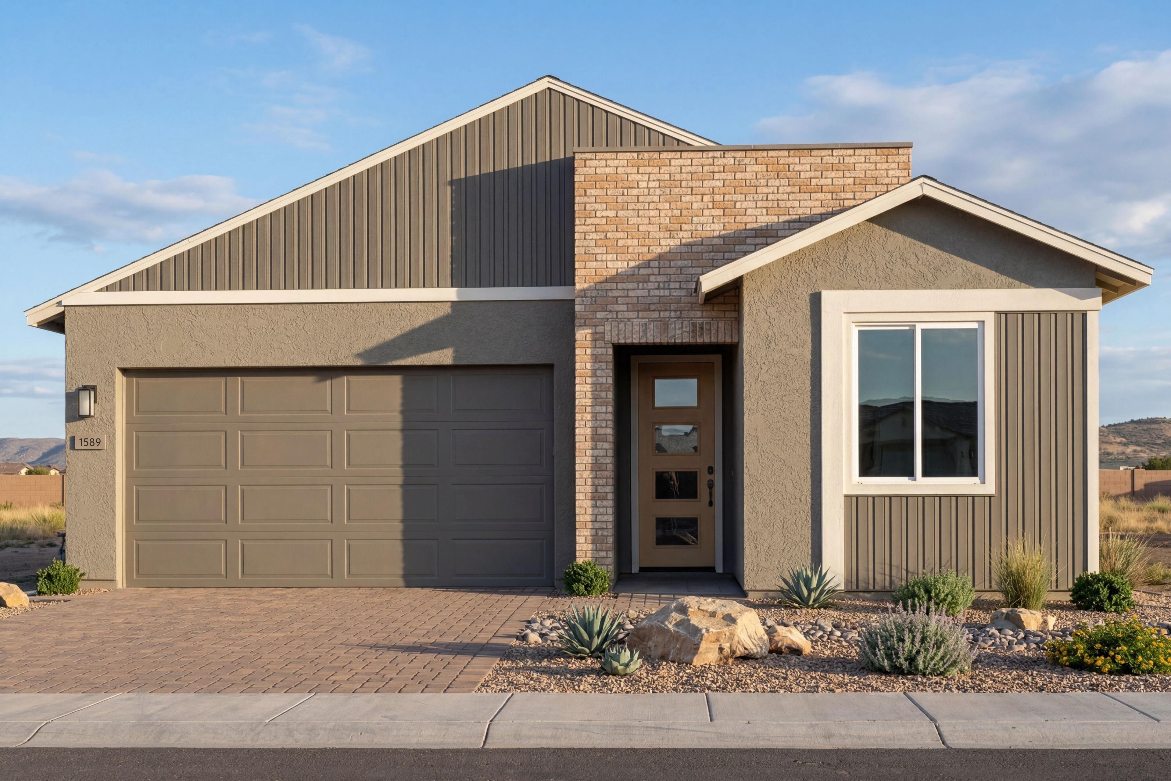Modern single-story exterior of The Frontier II H by Davidson Homes in Prescott, featuring a 3-car garage and brick accents.
